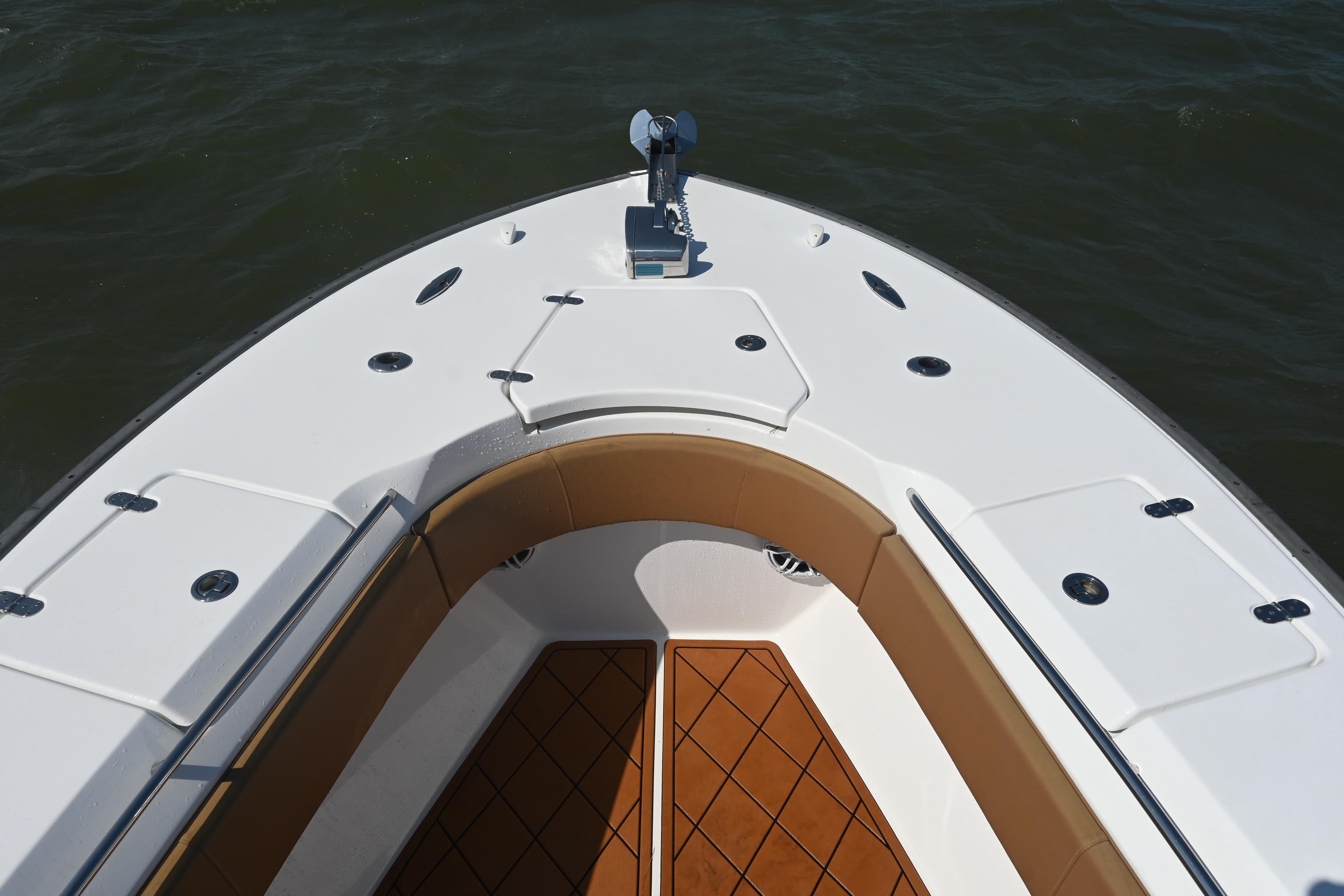 Bow view of 2021 Cape Horn 32 T boat with sleek design and spacious deck.