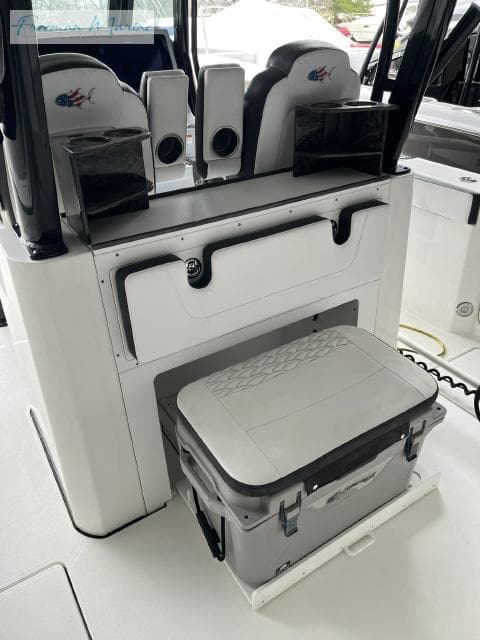 2022 Crevalle 33 CSF boat interior with seating and storage area.