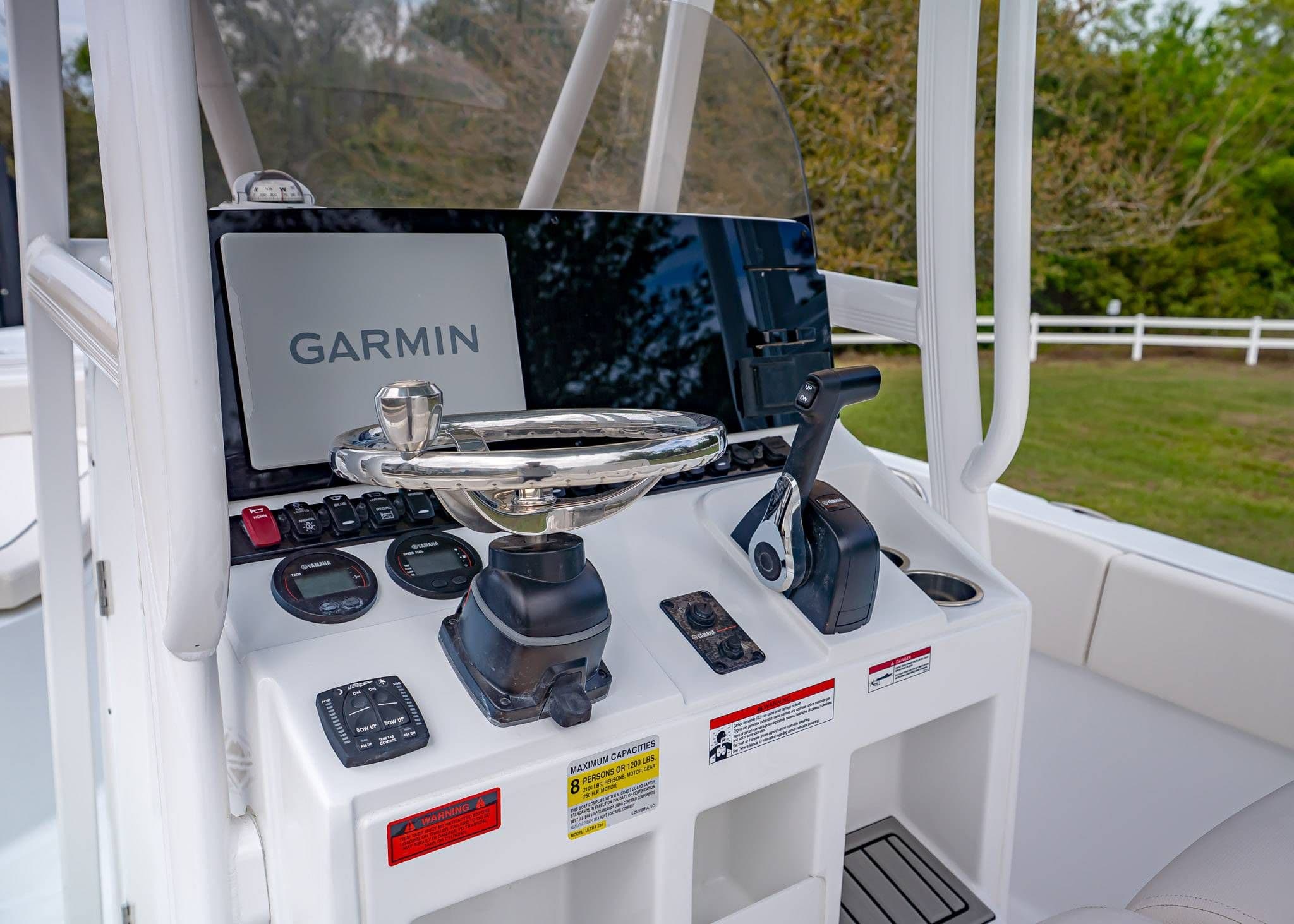 Sea Hunt Ultra 229 boat console, 2026 model, featuring Garmin navigation system.