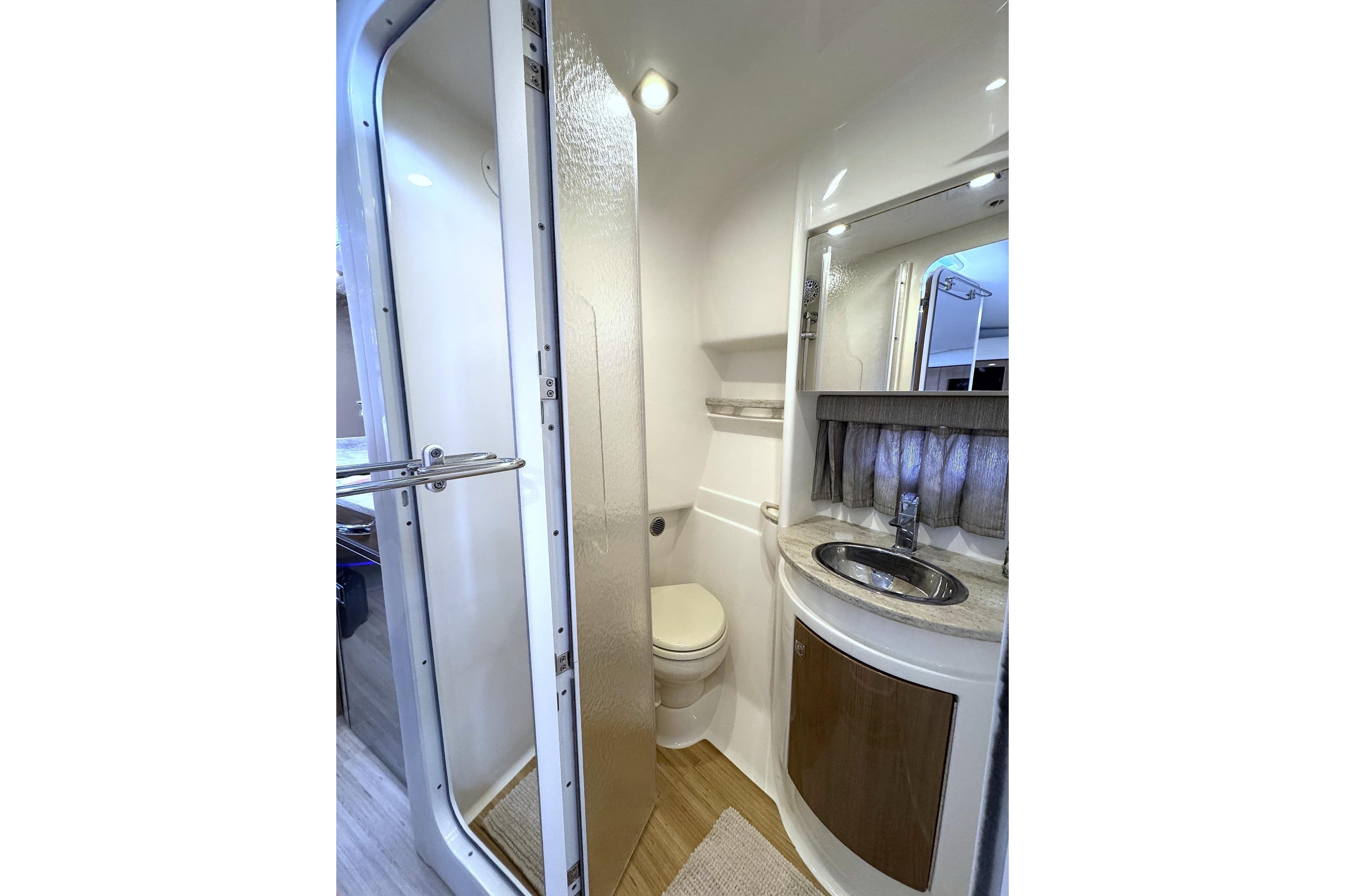 2016 Formula 34 Performance Cruiser bathroom with modern fixtures and compact design.