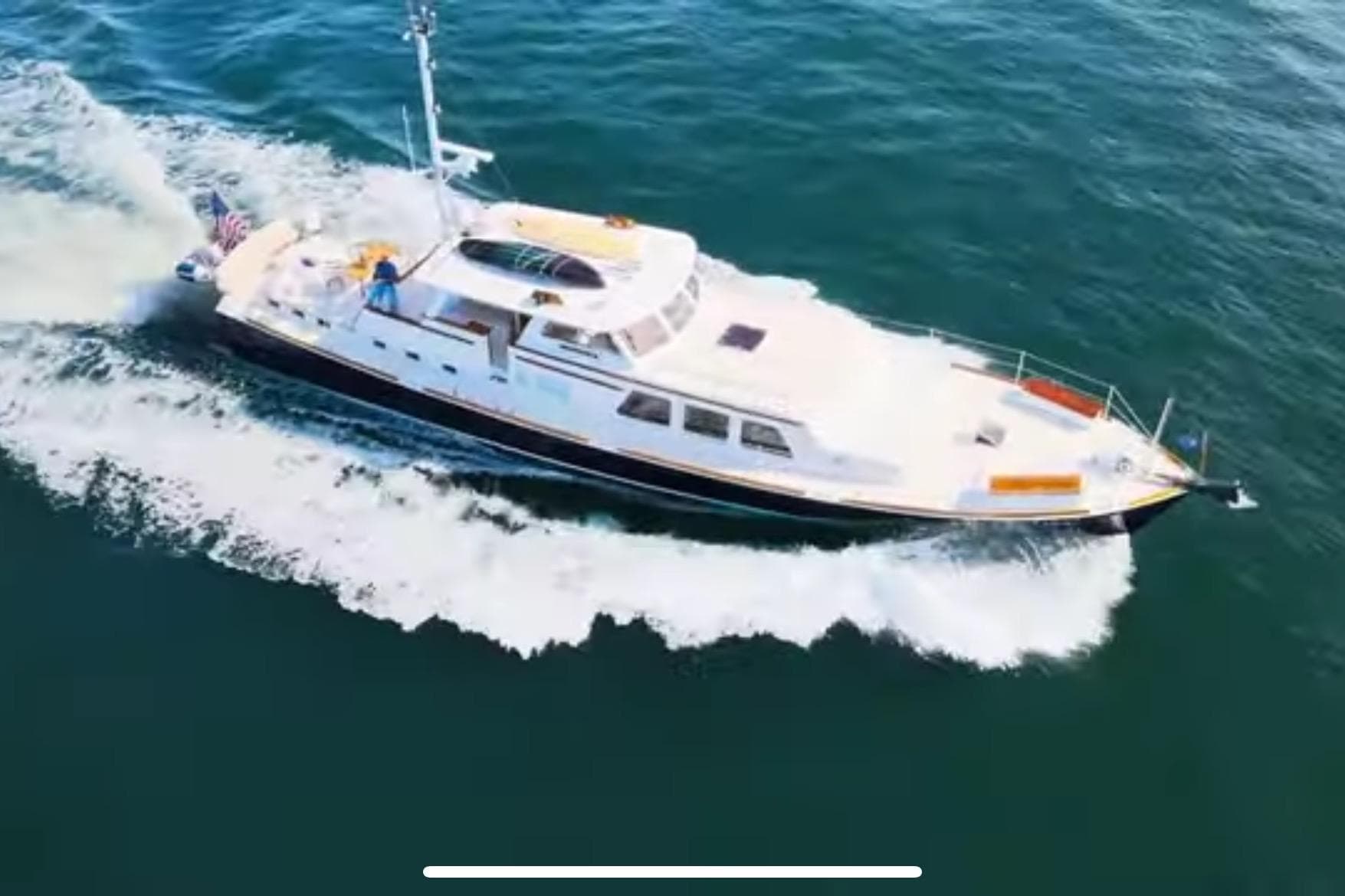 1969 Islander 72 Aft Cabin Motor Yacht cruising on open water.