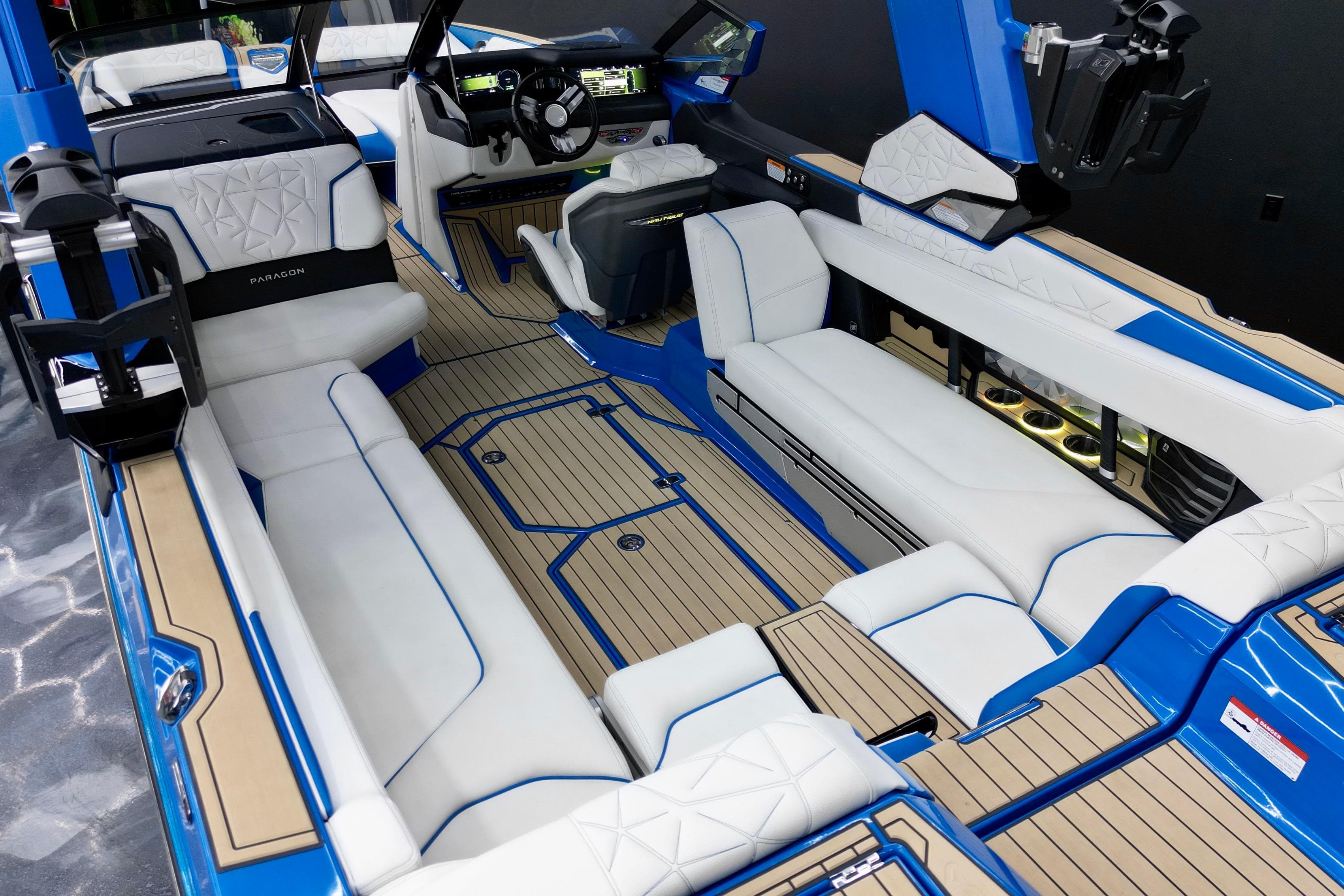 2022 Nautique Super Air Nautique G25 Paragon interior with luxurious seating and modern dashboard.