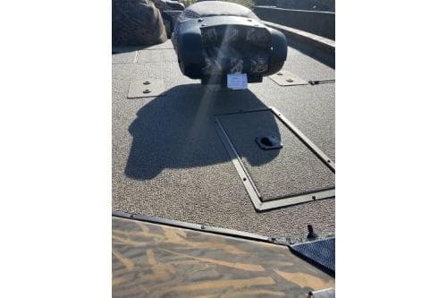 2026 G3 Sportsman 1810 PFX Camo boat deck with storage compartments.