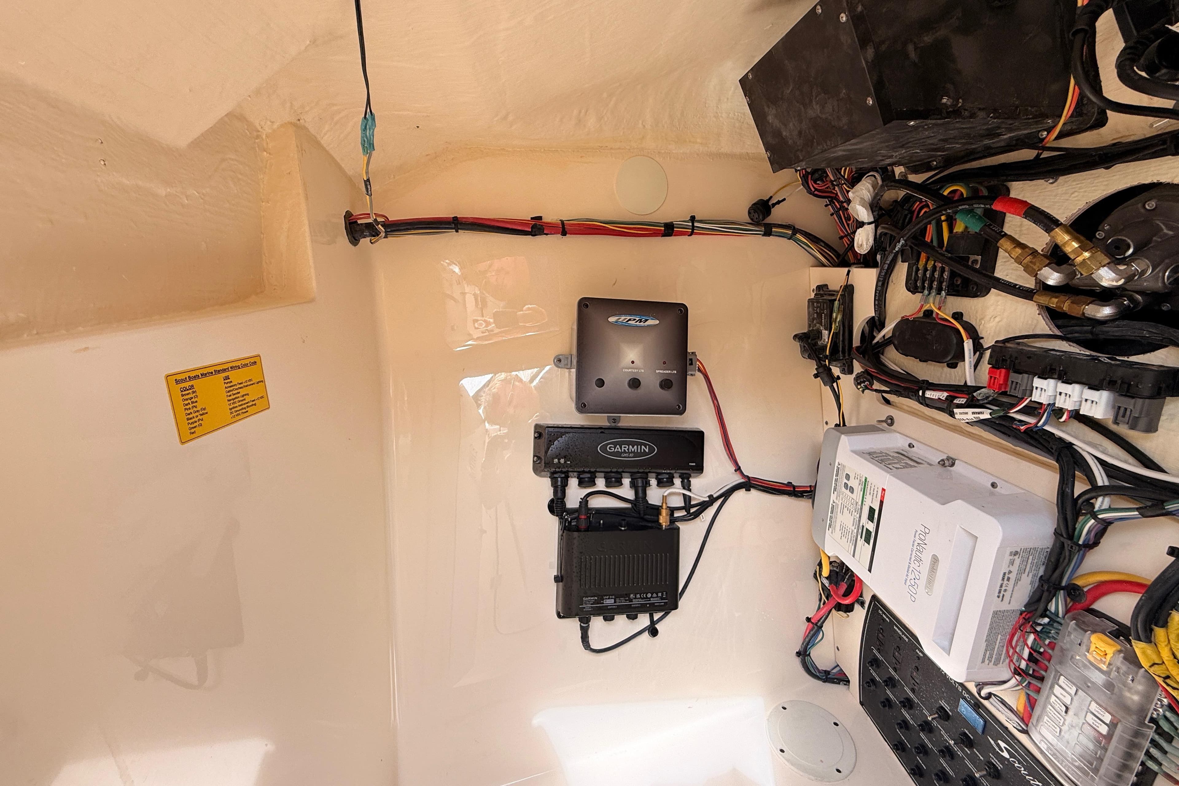 2023 Scout 255 Dorado boat interior wiring and electronic components setup.