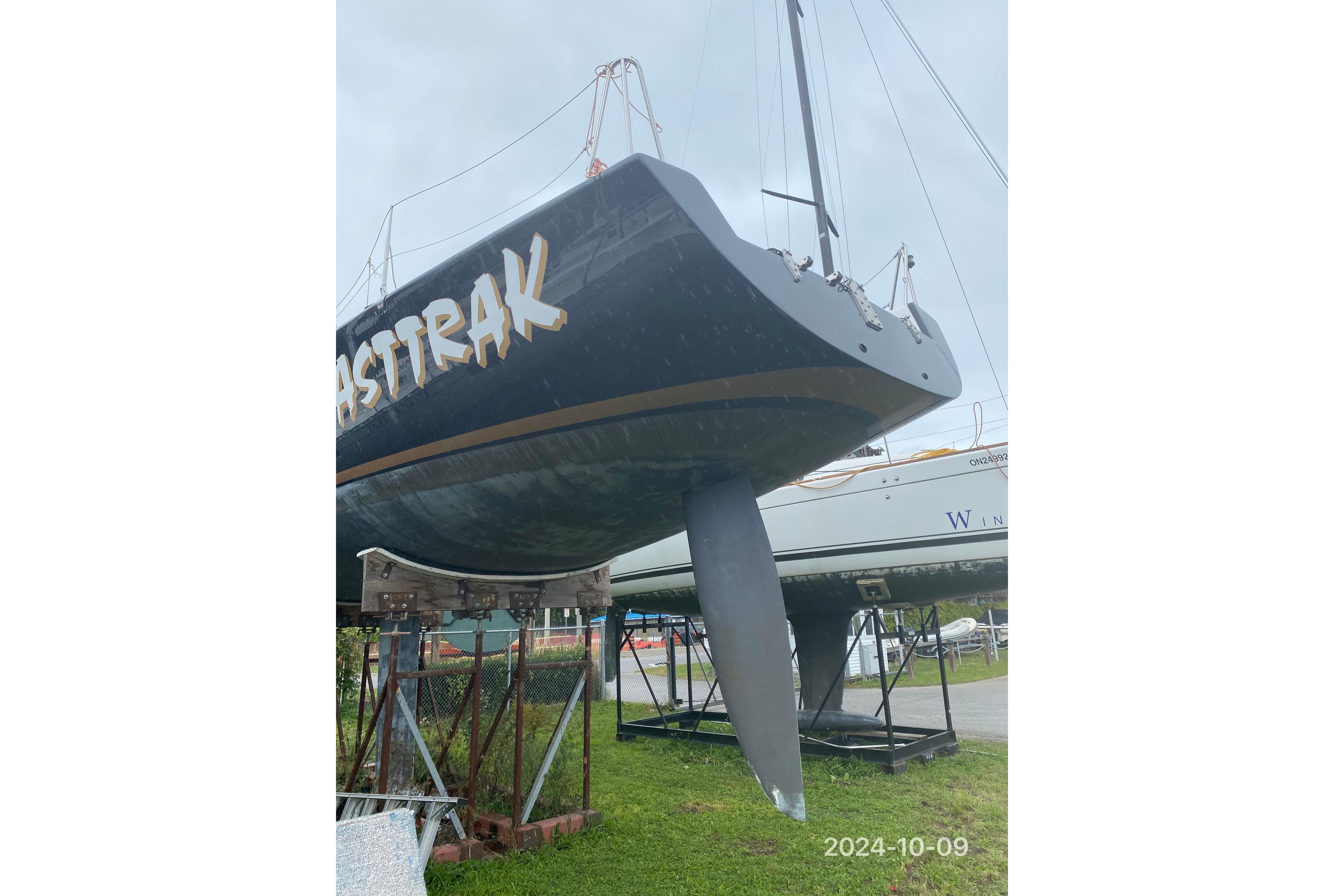 Sailboat "Fasttrak" on dry dock, Nelson Marek 43, 1993 model, overcast day.