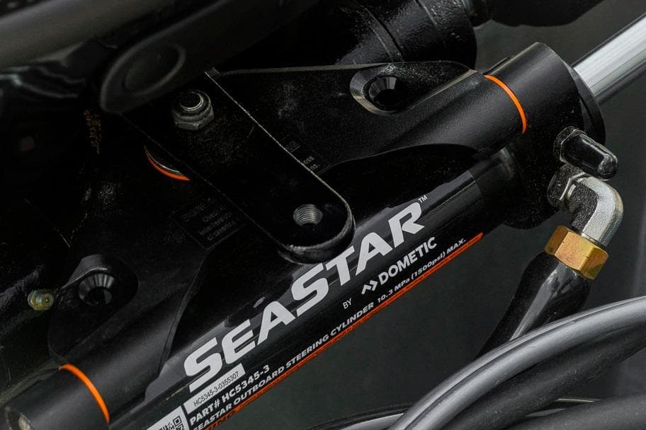 Close-up of SeaStar hydraulic steering cylinder on Dockside Pontoons 22DQ, 2026 model.