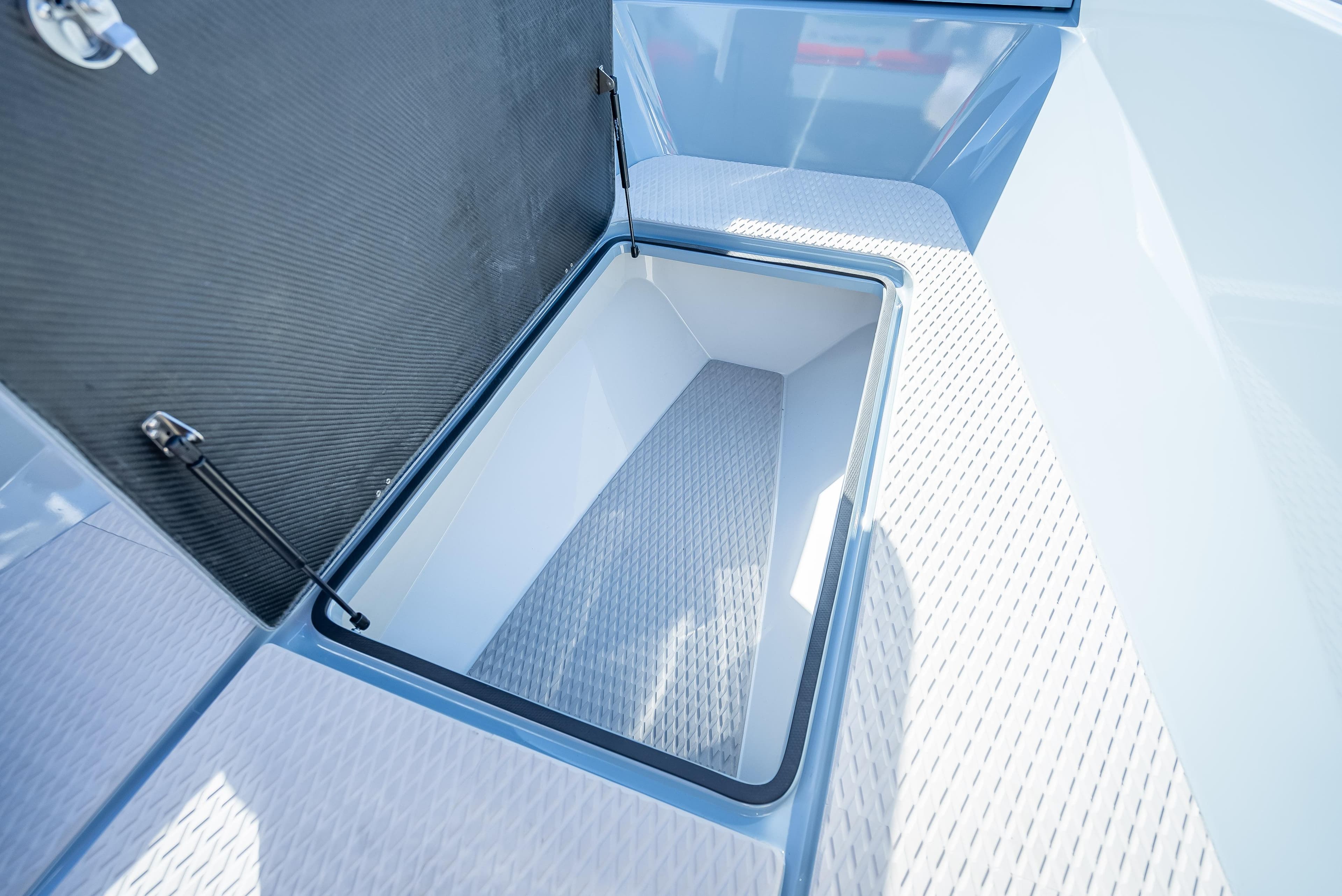 Storage compartment of the 2024 Goldfish 28 Tender boat.