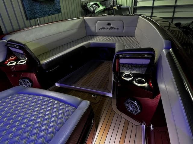 2020 Nor-Tech 390 Sport Center Console interior with luxurious seating and ambient lighting.