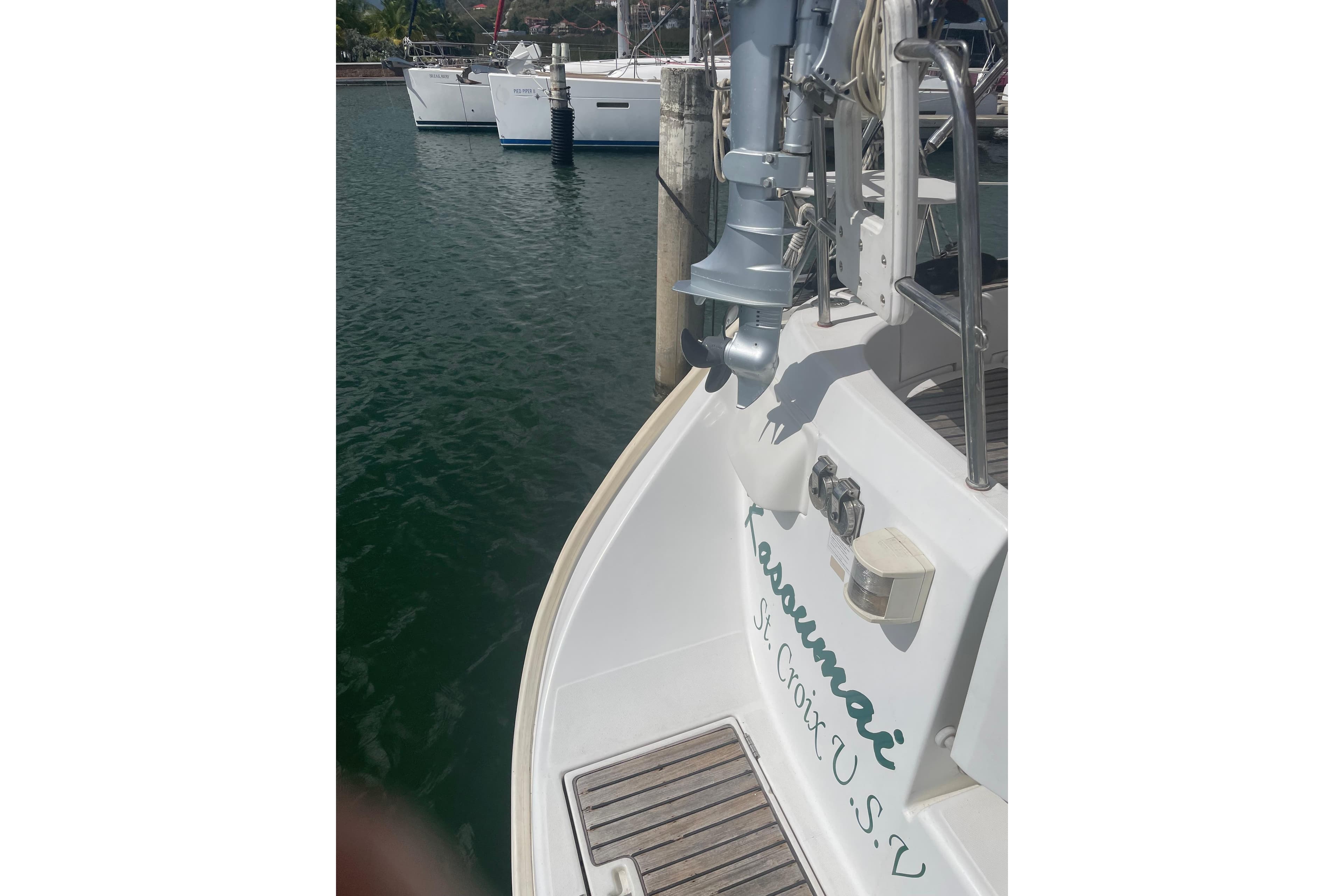 Beneteau 423 sailboat docked, rear view, 2007 model, St. Croix registration.