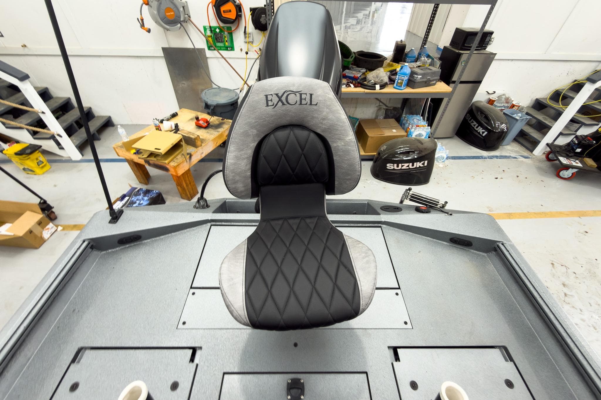 2026 Excel 230 Bay Pro Elite boat seat in a workshop setting.