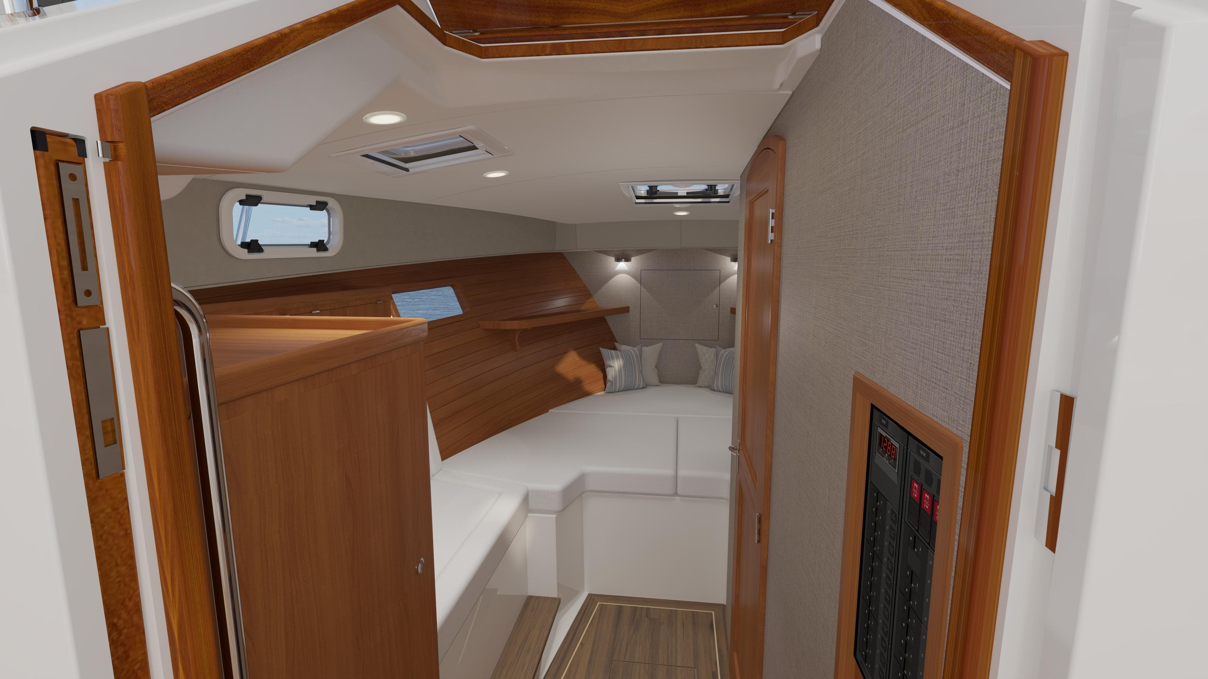 Luxurious interior of 2026 MJM 38R yacht cabin with wood accents and modern design.