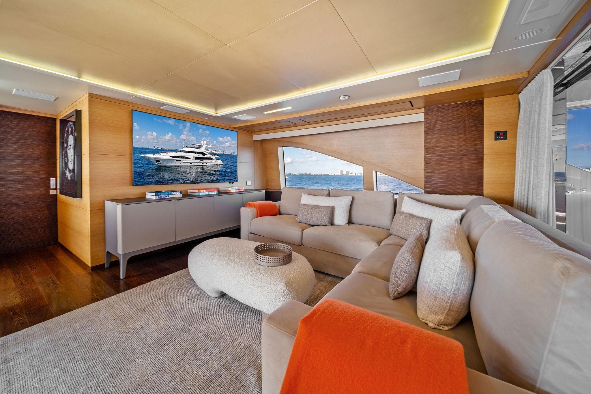 Luxurious interior of 2012 Benetti Classic Supreme 132 yacht with modern decor and ocean view.
