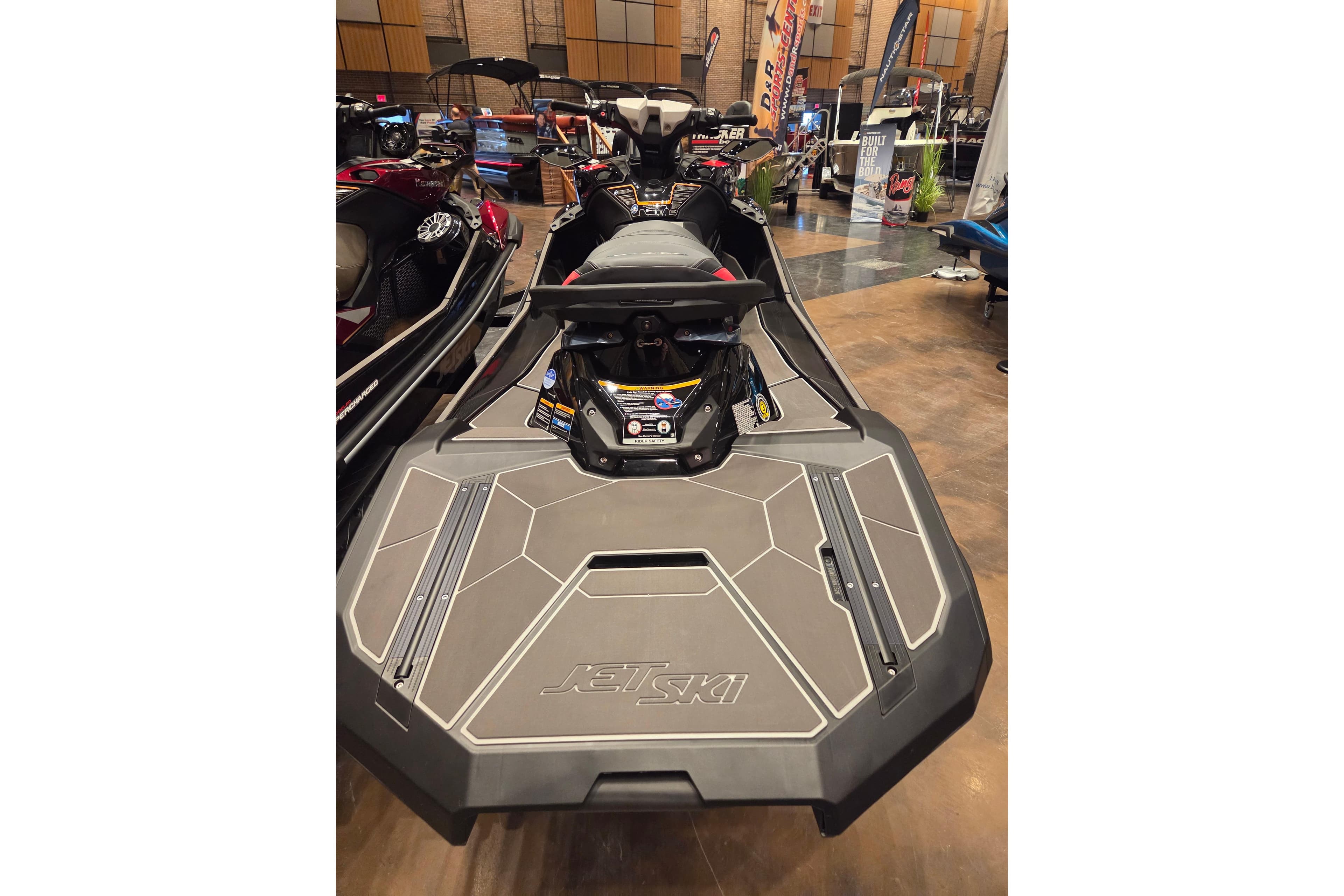 2026 Kawasaki ULTRA 160LX-S jet ski displayed at an indoor exhibition.