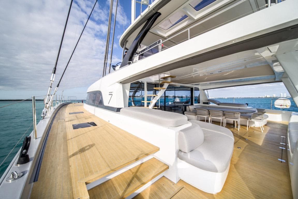 Luxurious 2020 Lagoon SEVENTY 7 yacht with spacious deck and modern seating area.
