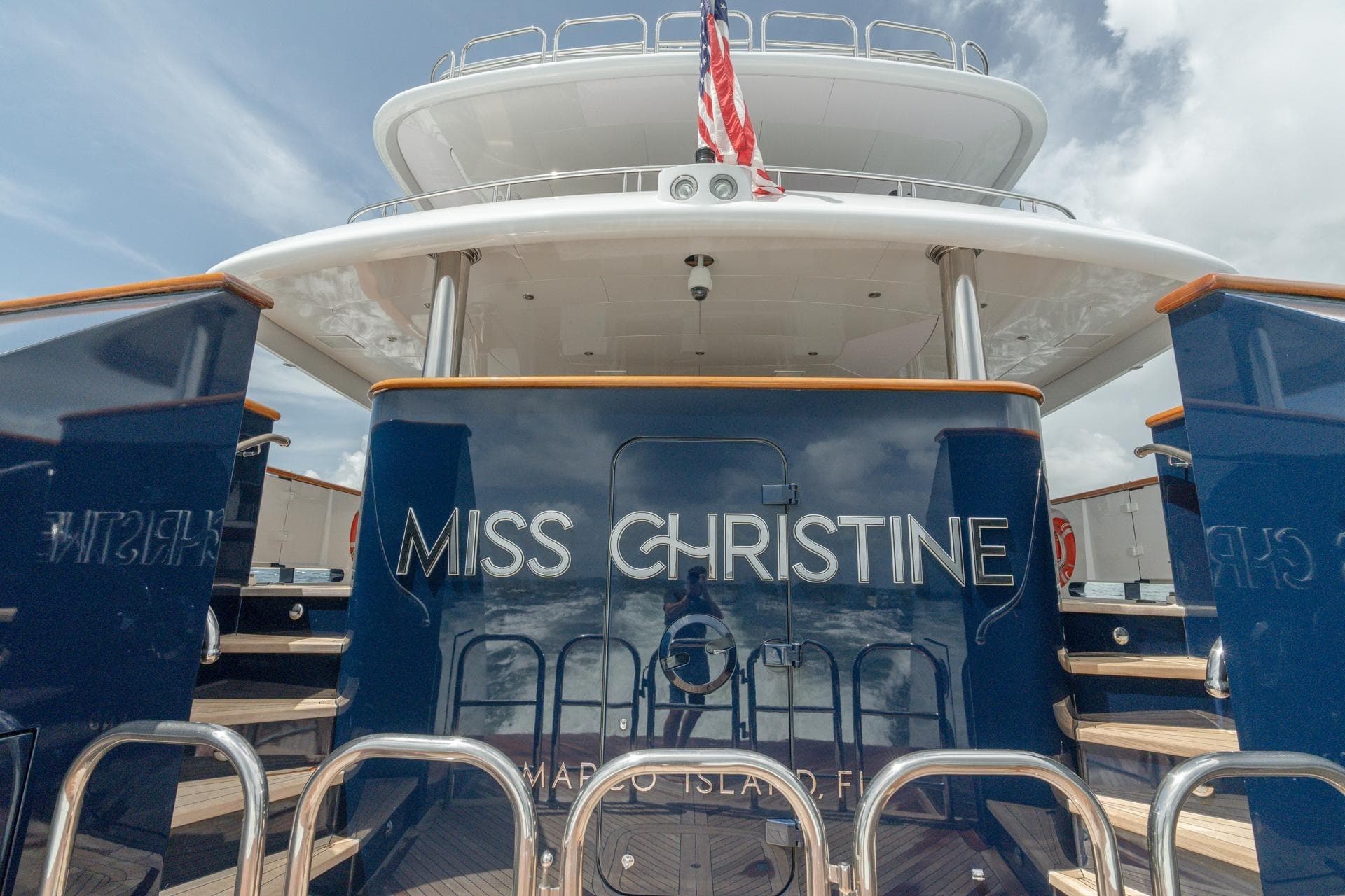 Luxury 2006 Trinity Tri-Deck Motor Yacht "Miss Christine" docked, showcasing elegant design.