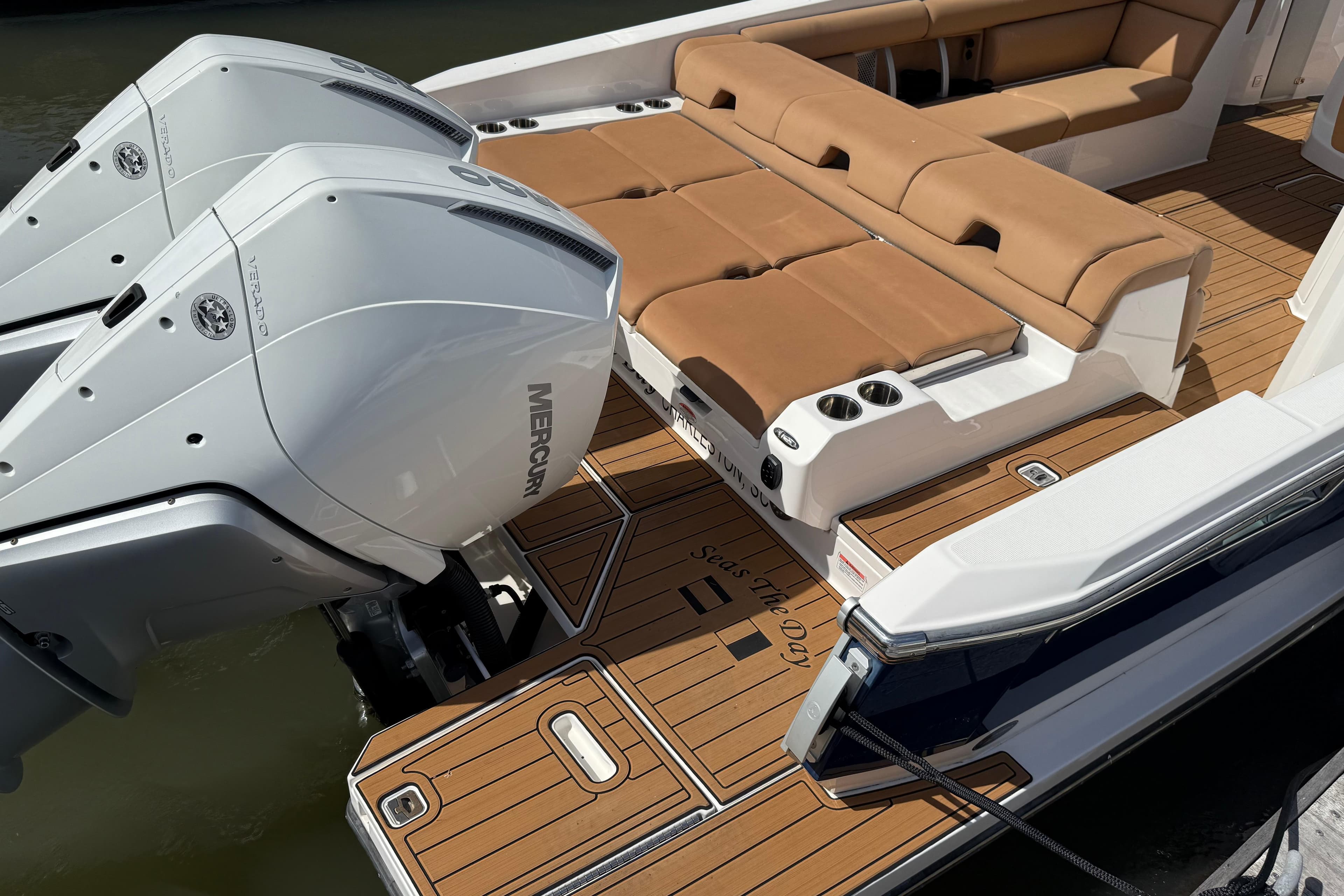 2022 Aviara AV32 OB boat with twin Mercury outboard engines and luxurious seating.