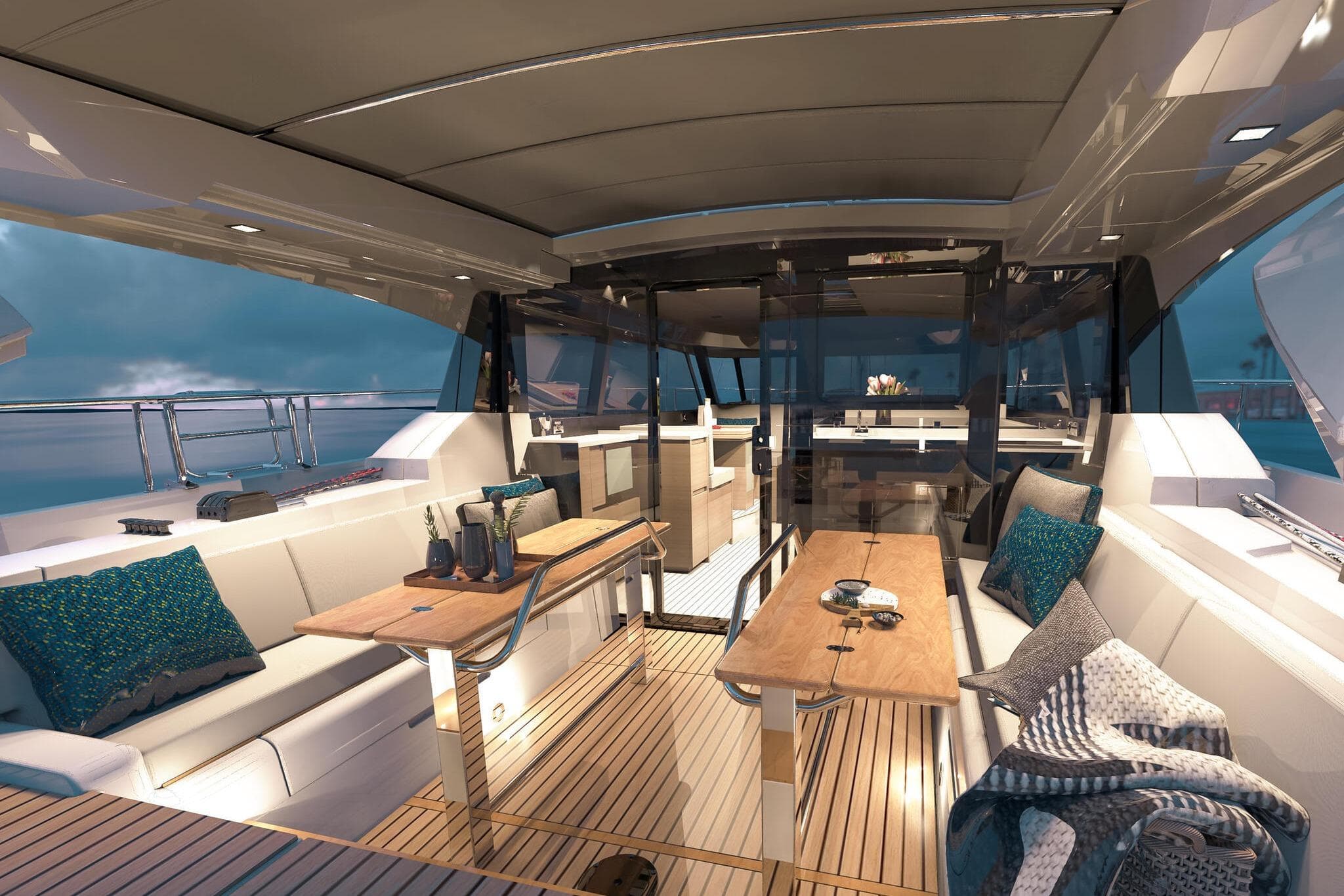 Luxurious interior of 2026 Moody 48 Deck Salon yacht with elegant seating and wooden tables.