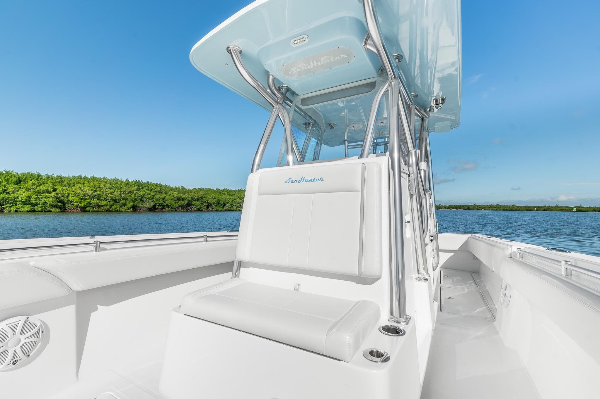 2025 SeaHunter 31 Tournament boat on calm water, featuring sleek design and spacious seating.