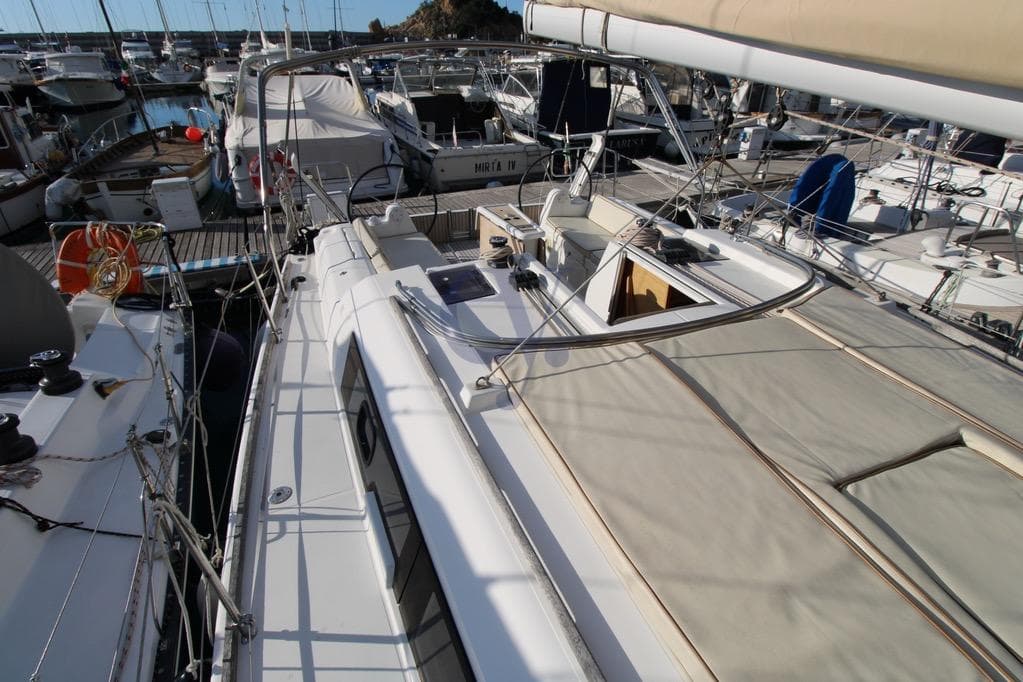 2017 Dufour 382 Grand Large yacht docked in a marina.