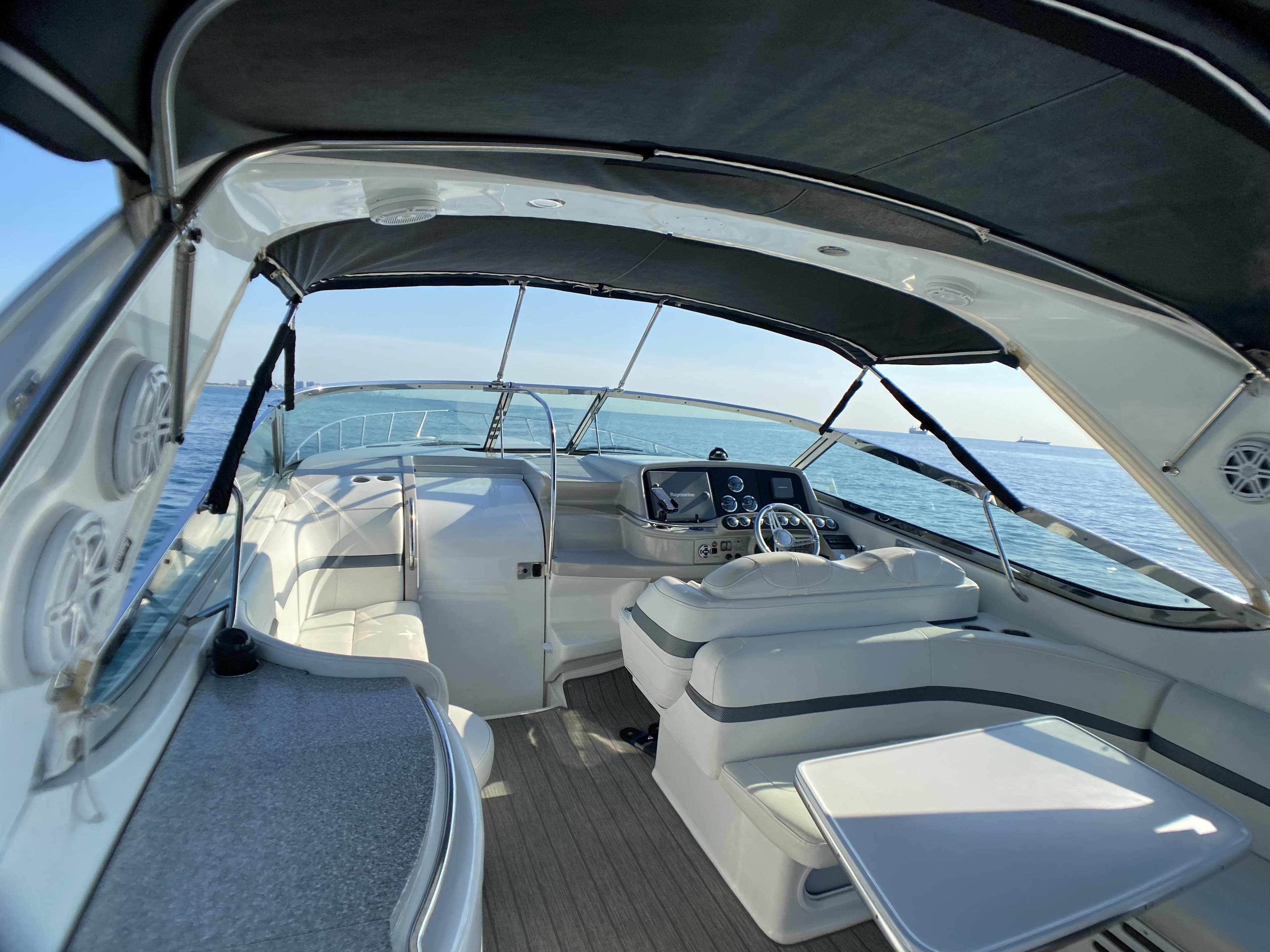 2006 Formula 400 Super Sport boat interior with seating and helm, on open water.