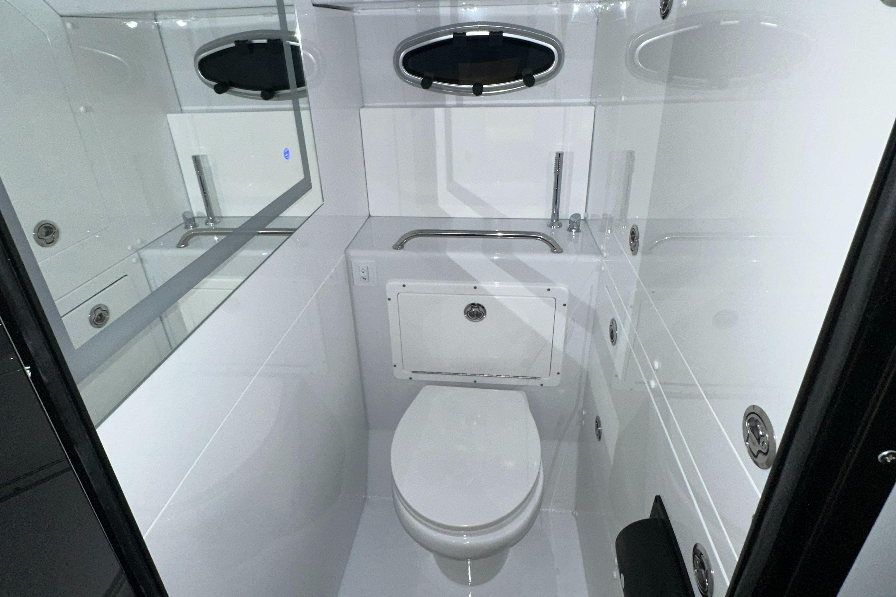 2023 Life Proof 35 Full Cabin boat bathroom with modern fixtures and sleek design.