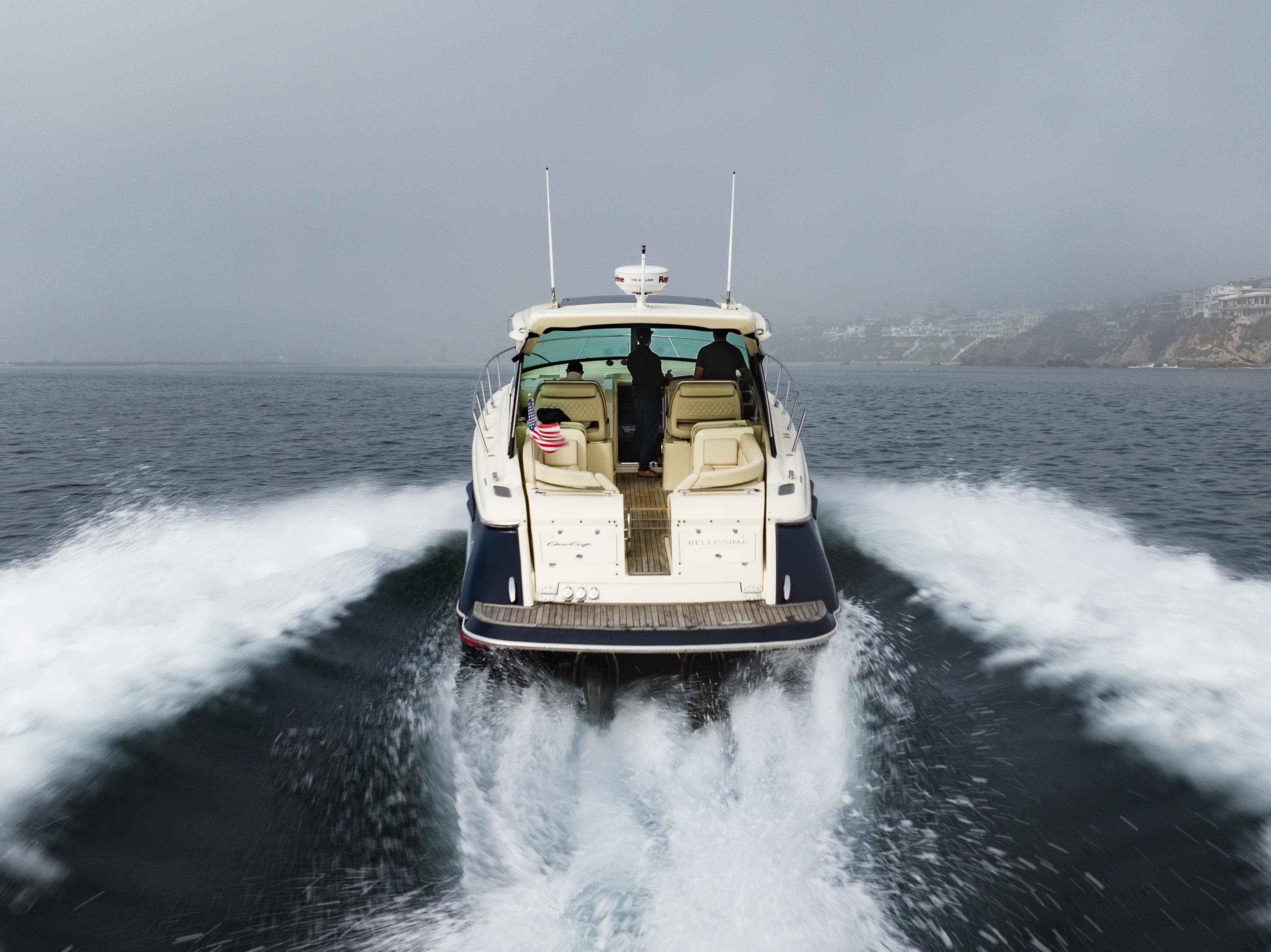 2014 Chris-Craft Corsair 36 Hard Top cruising on open water.