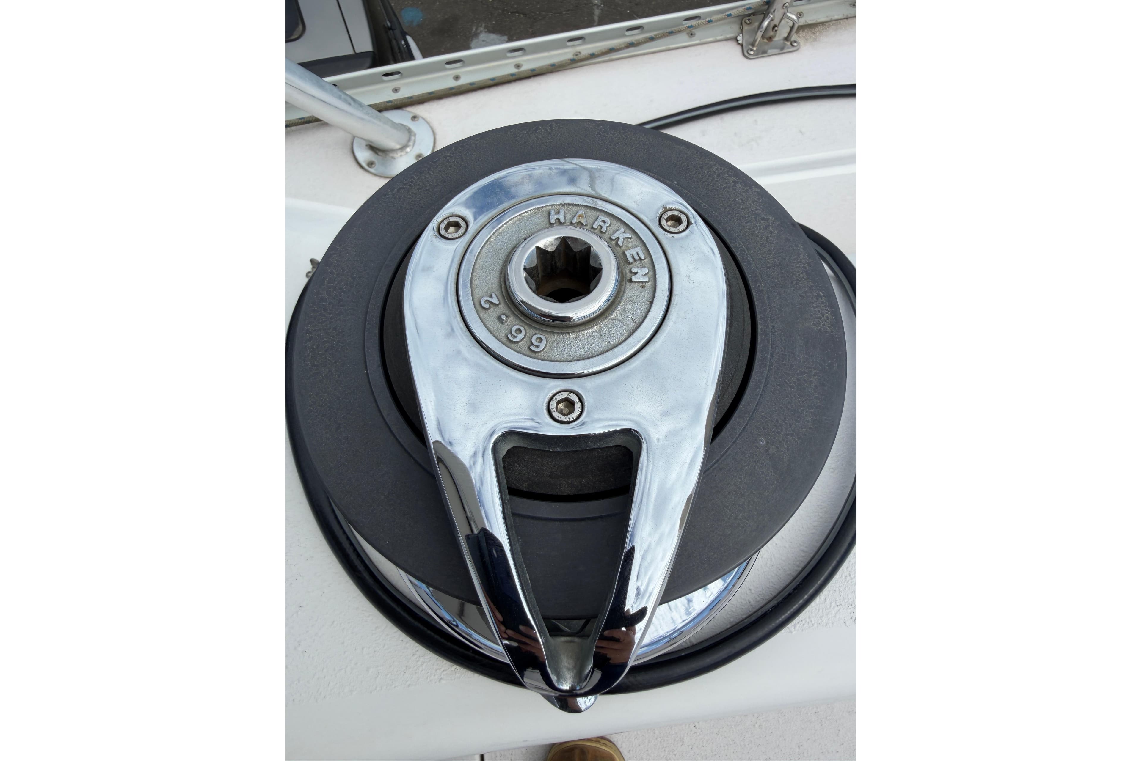 Harken winch on a 2002 Catalina 470 sailboat deck.