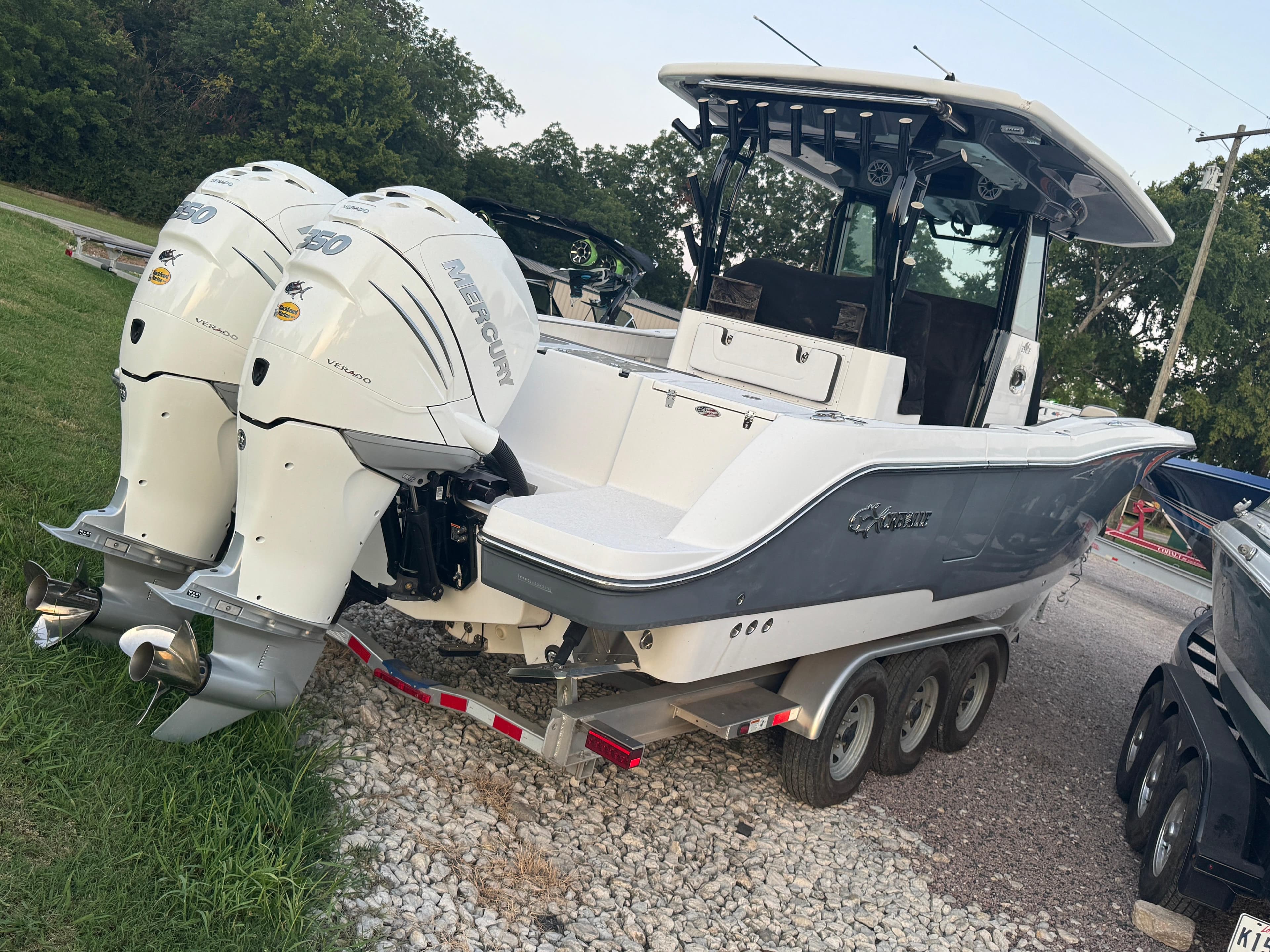 2022 Crevalle 33 CSF boat with twin Mercury engines on a trailer.
