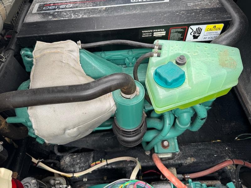 Engine compartment of a 1989 Carver 30 Santego boat, featuring Volvo Penta components.