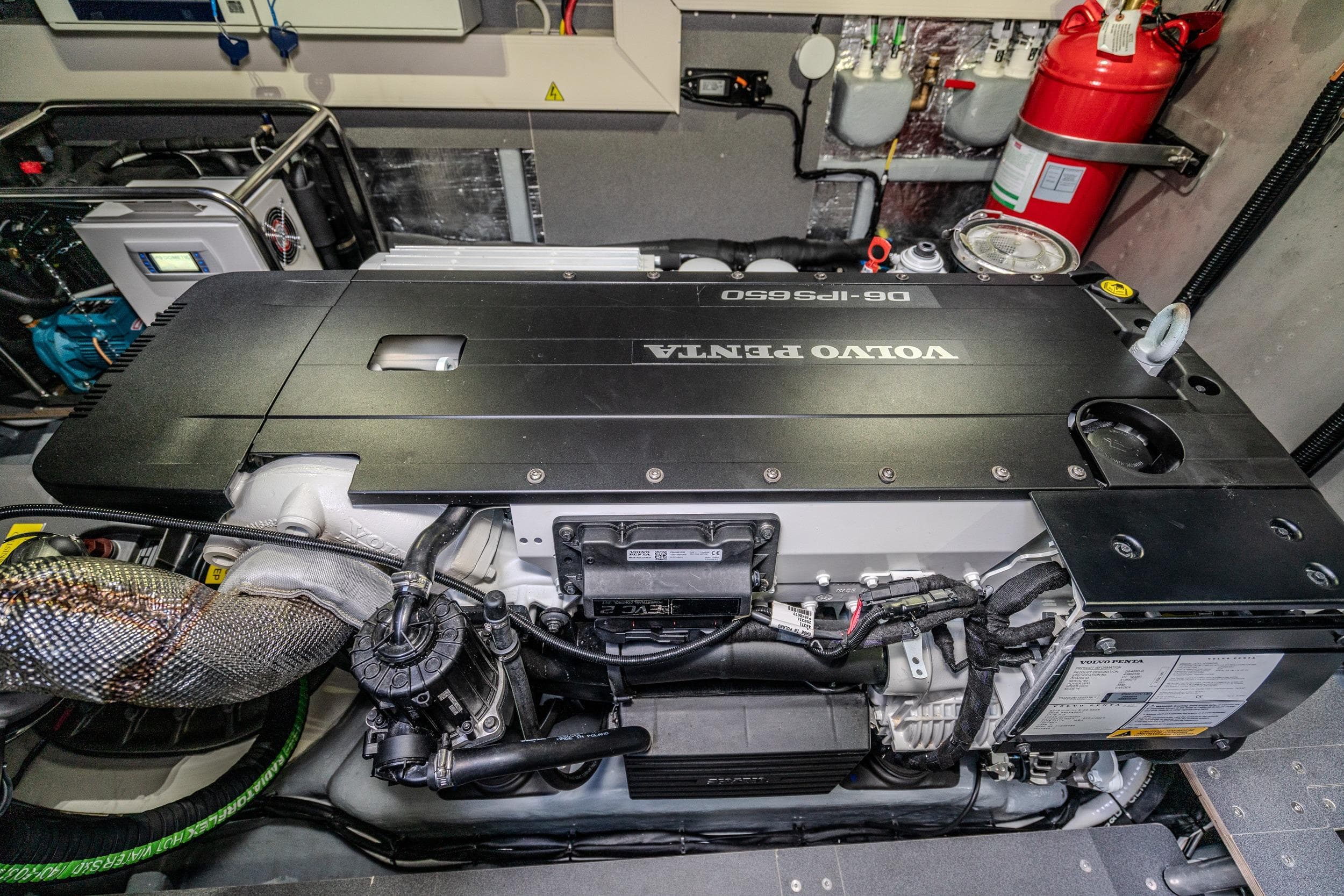 Engine room of 2026 Absolute 48 Coupe featuring Volvo Penta D8-IPS650 engine.