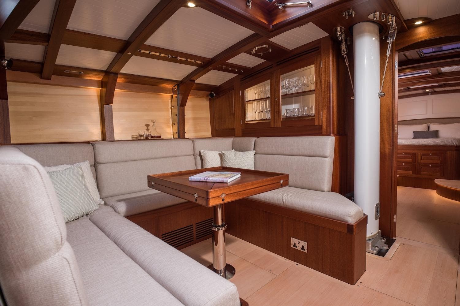 Luxurious interior of 2023 Spirit Yachts C72, featuring elegant wood and plush seating.
