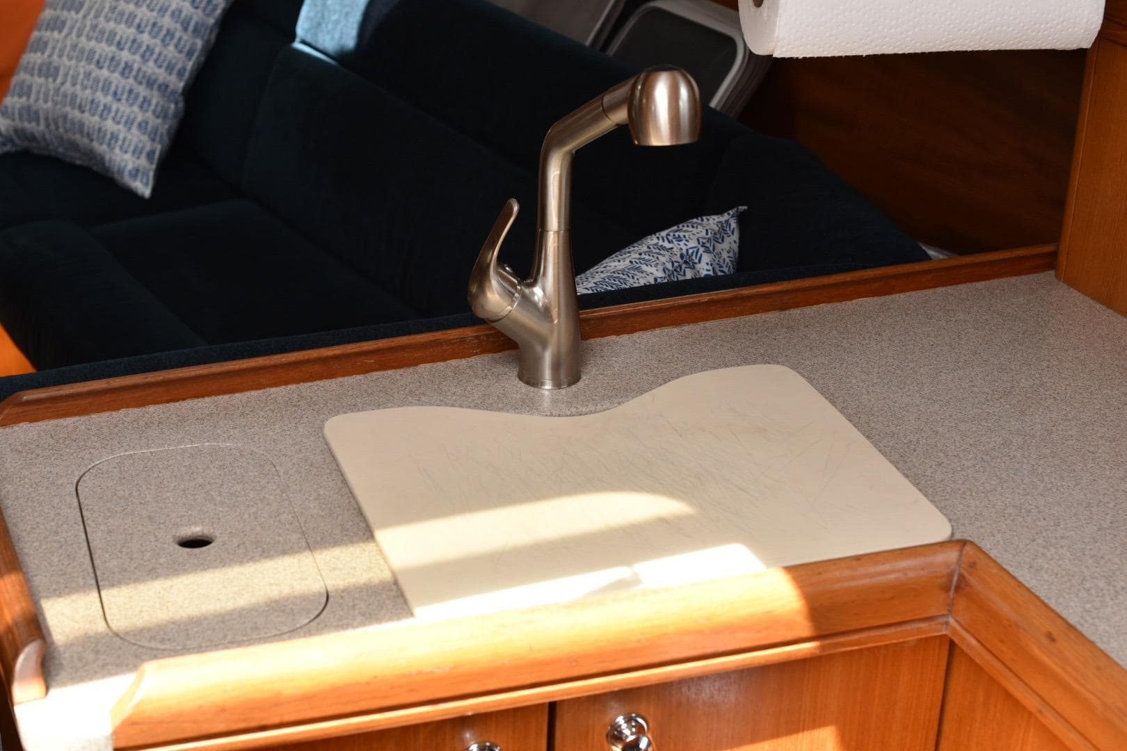 Interior of 2001 Marlow-Hunter 320 sailboat featuring a compact kitchen sink area.