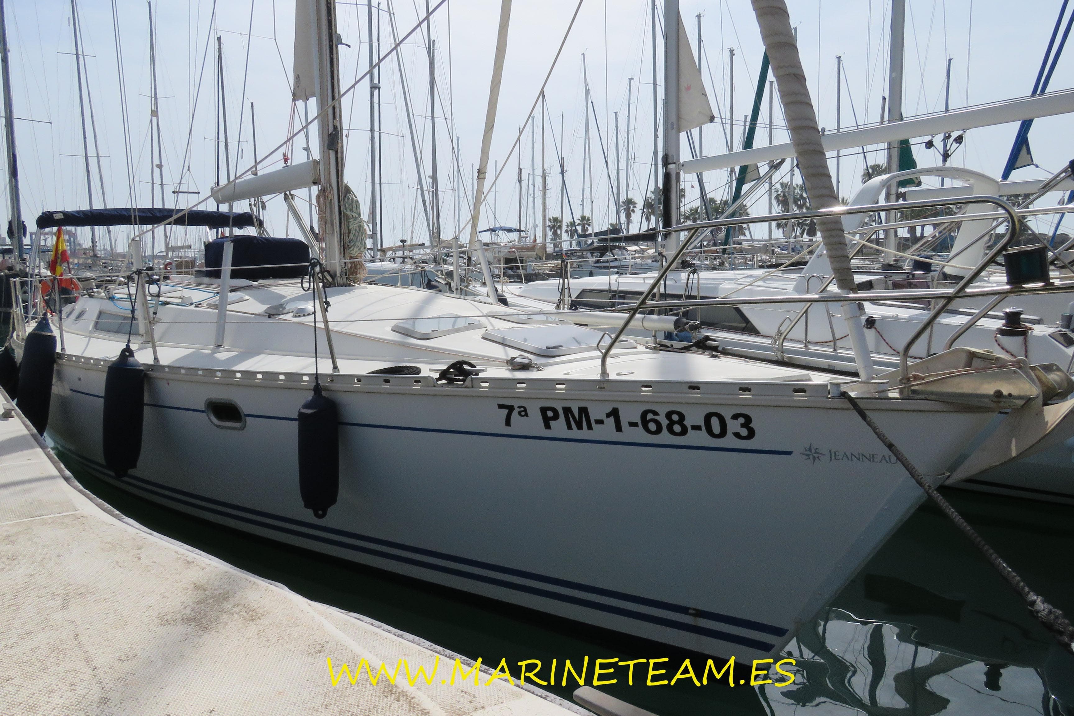Jeanneau Sun Odyssey 45.1 sailboat docked in marina, 1995 model.