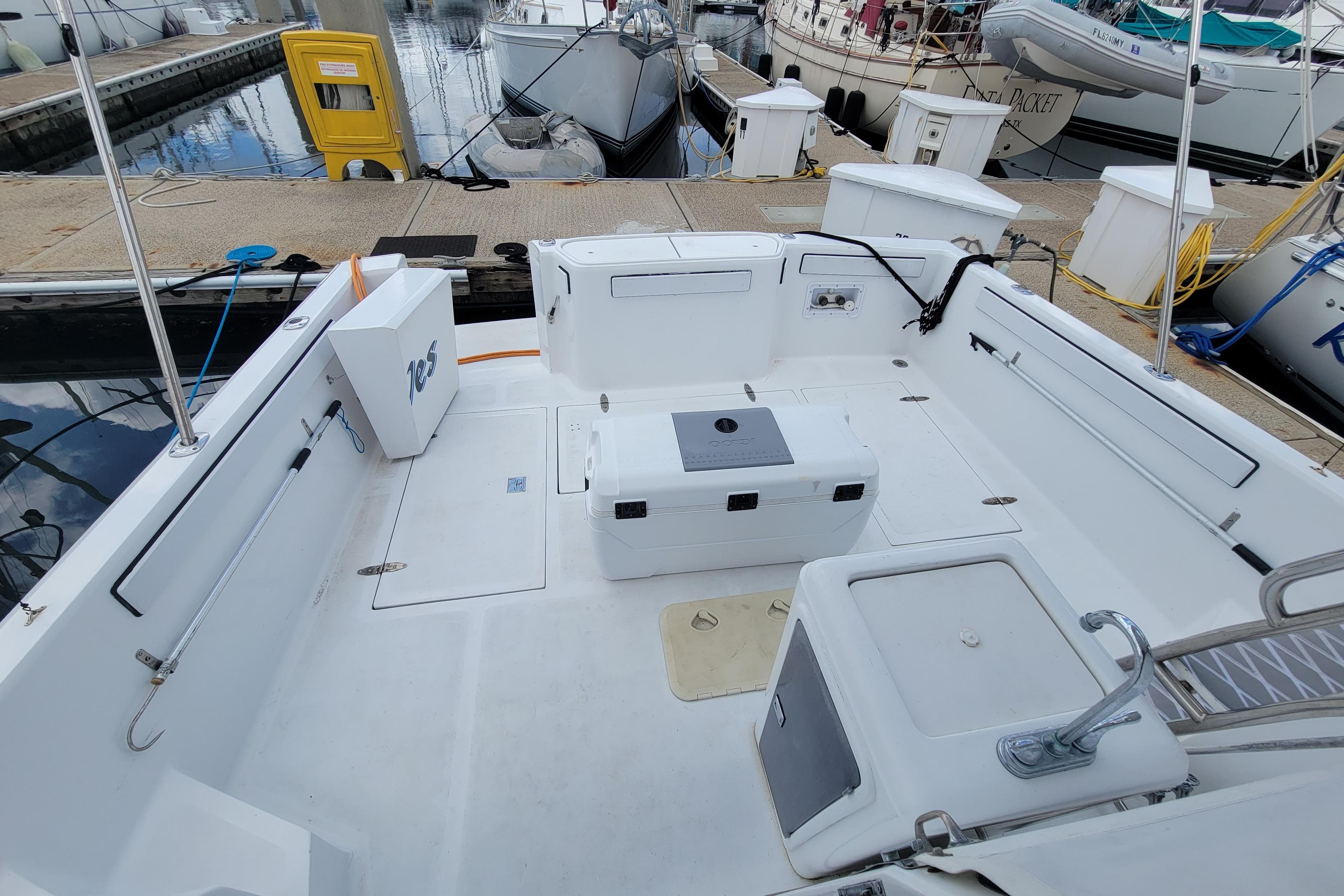 Open deck of a 1992 Mediterranean 38 boat docked at a marina.