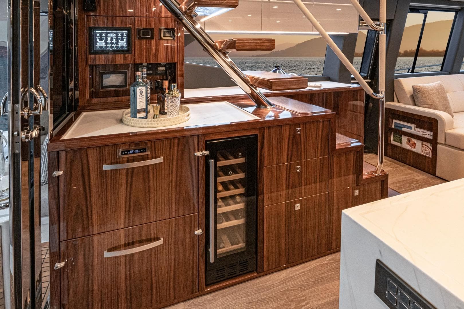 Luxurious interior of 2026 Riviera 64 Sports Motor Yacht Series II with elegant wood finishes.
