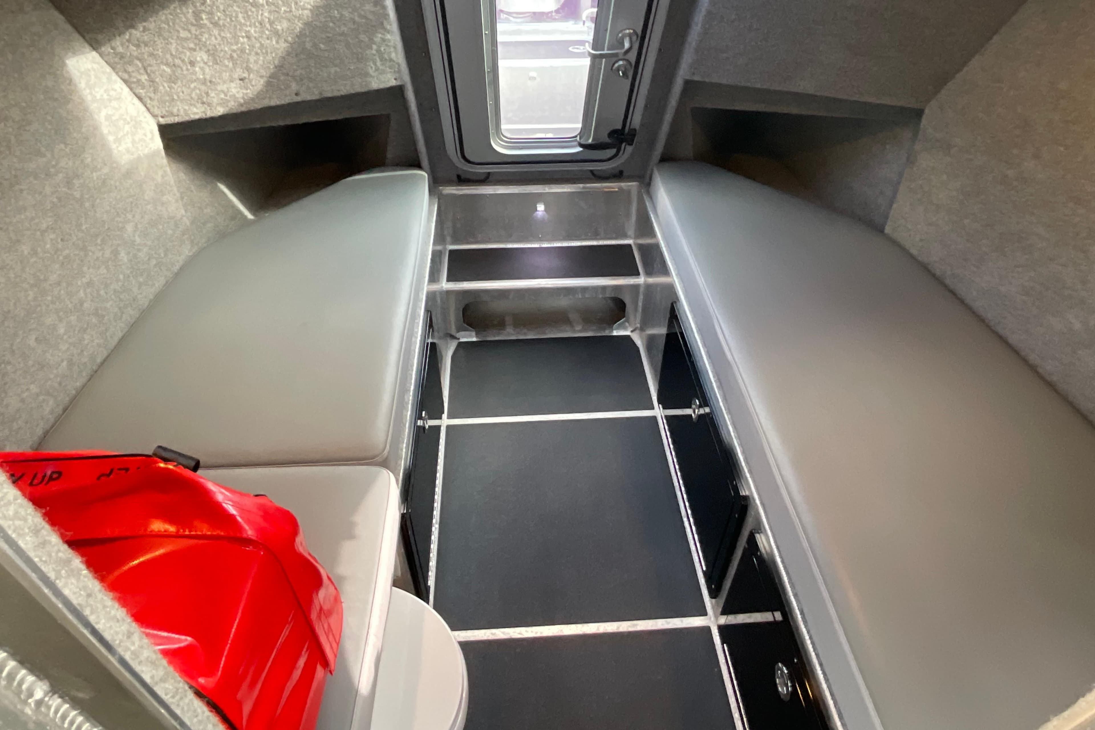Interior of 2025 Life Proof 31 GT Coupe, featuring sleek seating and modern design.