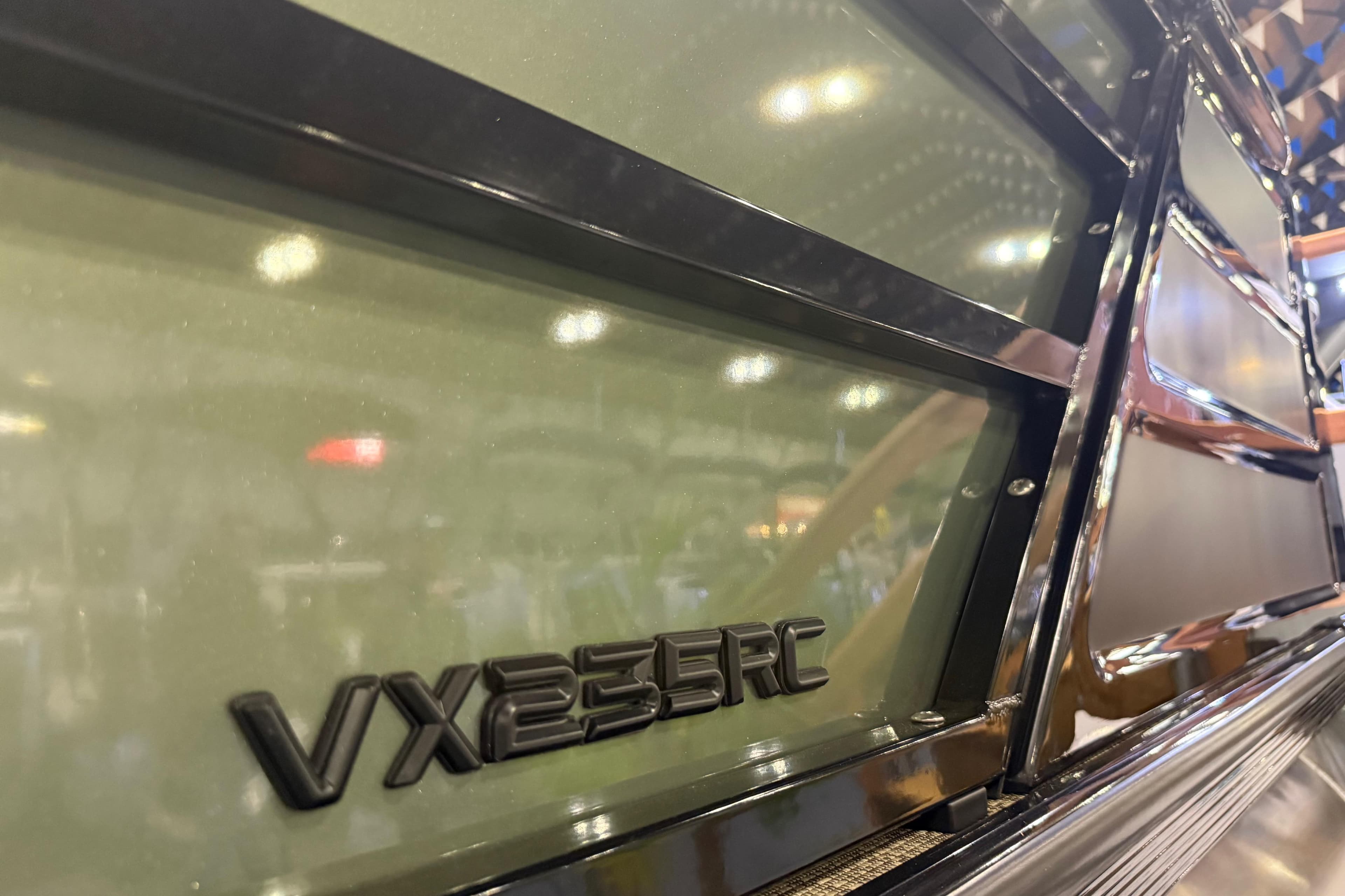2026 Veranda VX 235 RC boat, close-up of sleek exterior design and model badge.