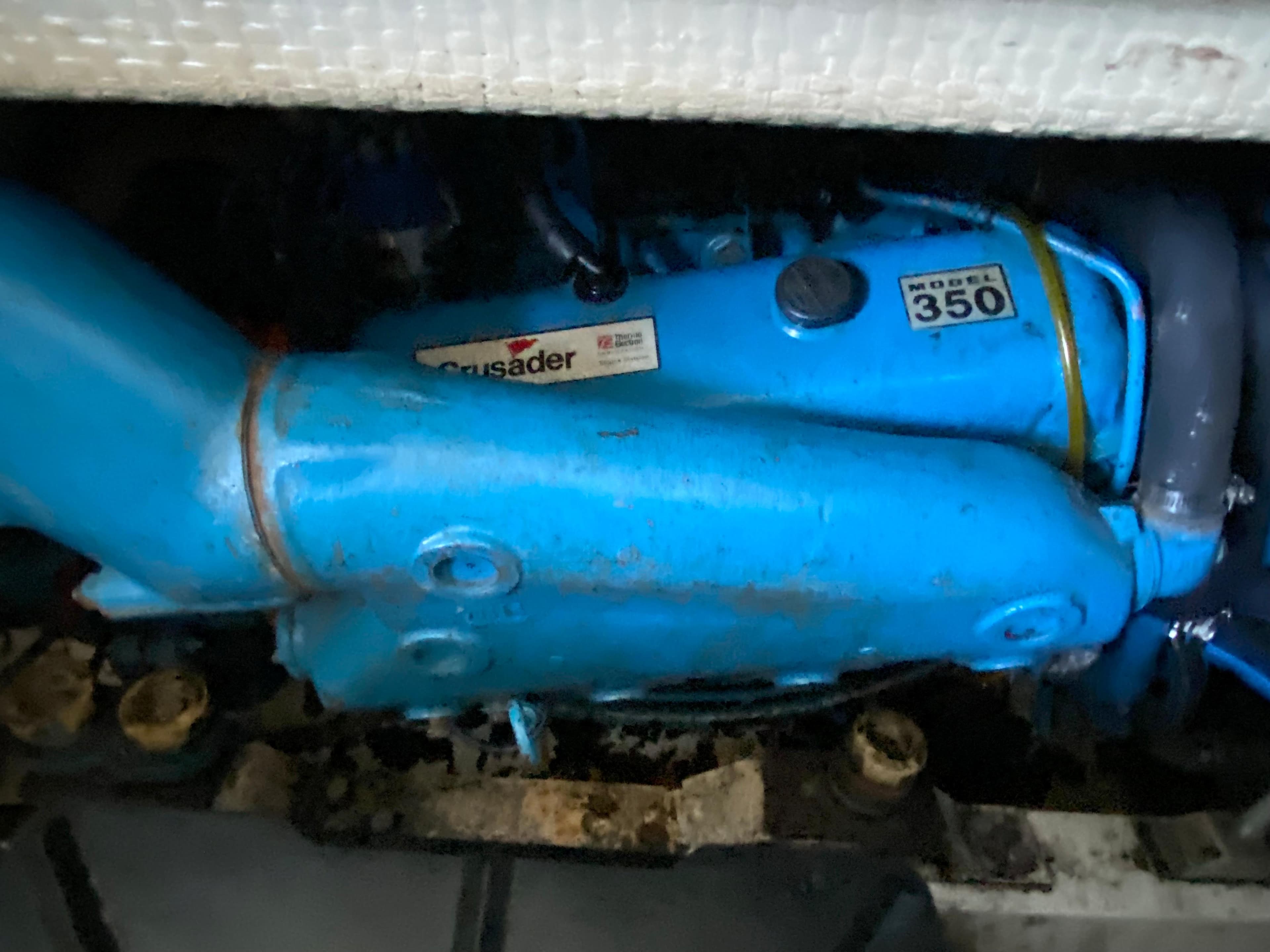 1984 Trojan 10 Meter Sedan Crusader 350 engine in blue.