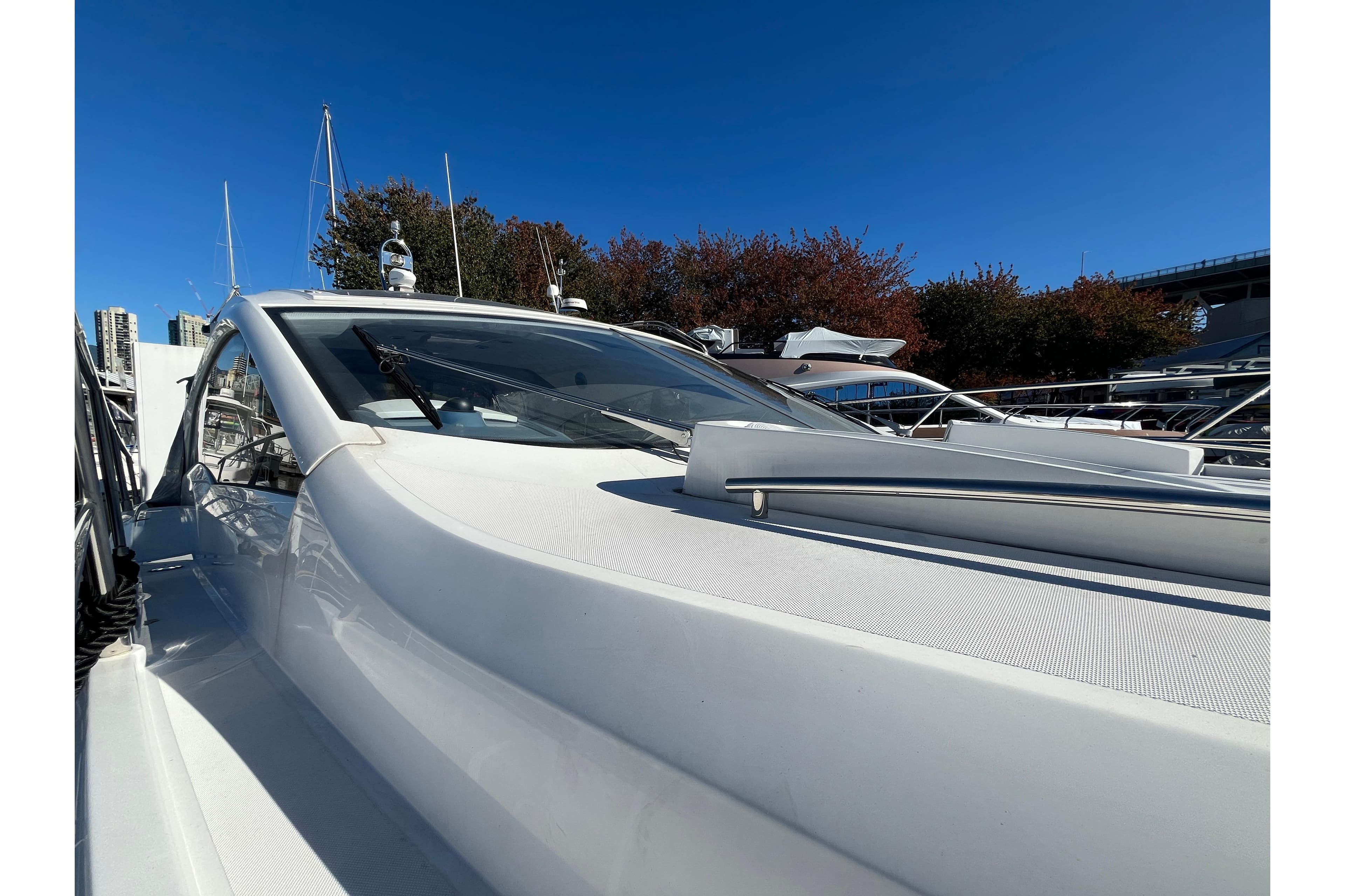 2024 Sessa Marine C38 yacht docked under clear blue sky.