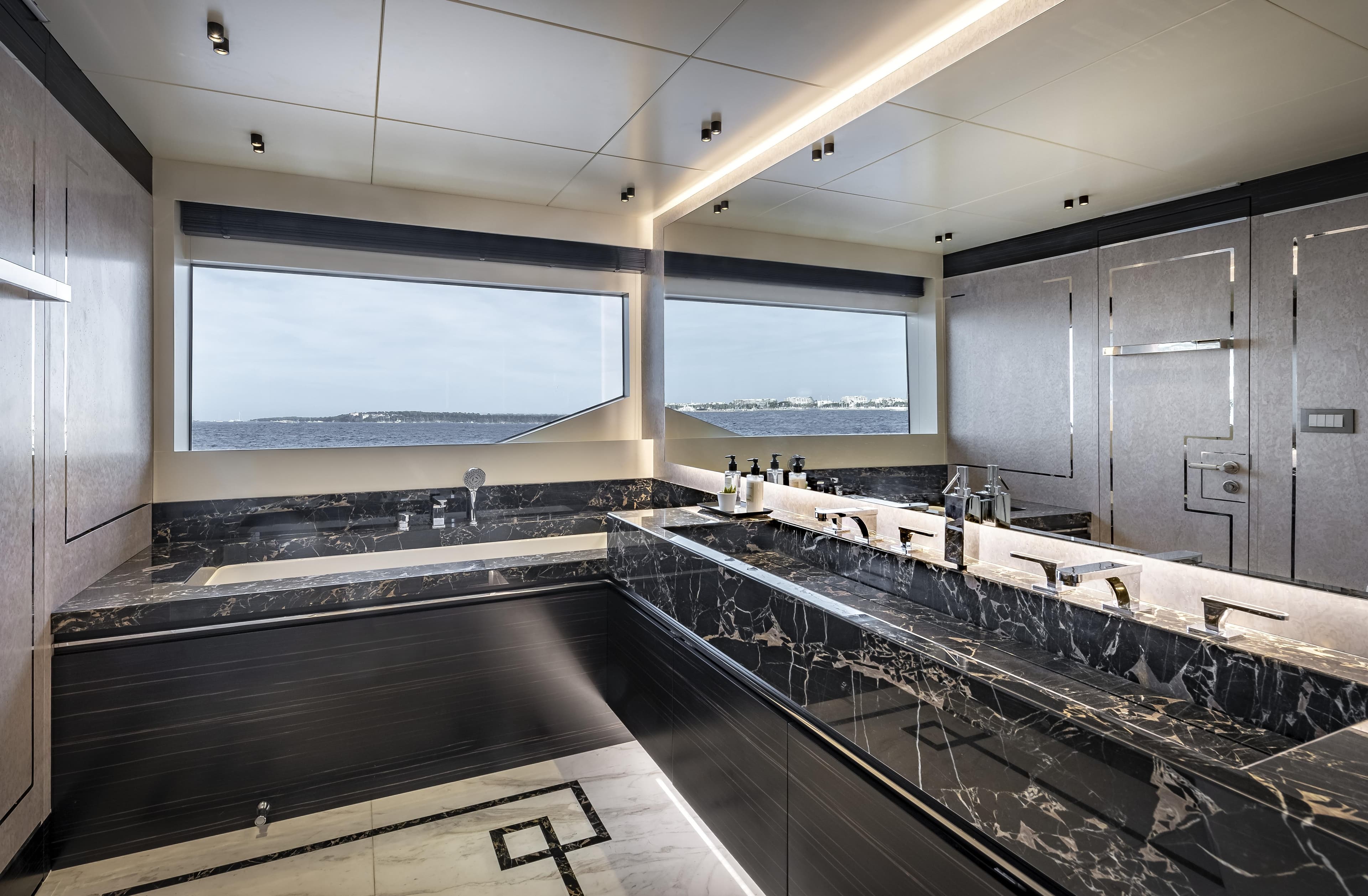 Luxurious bathroom in the 2025 Numarine 37XP yacht with ocean view.