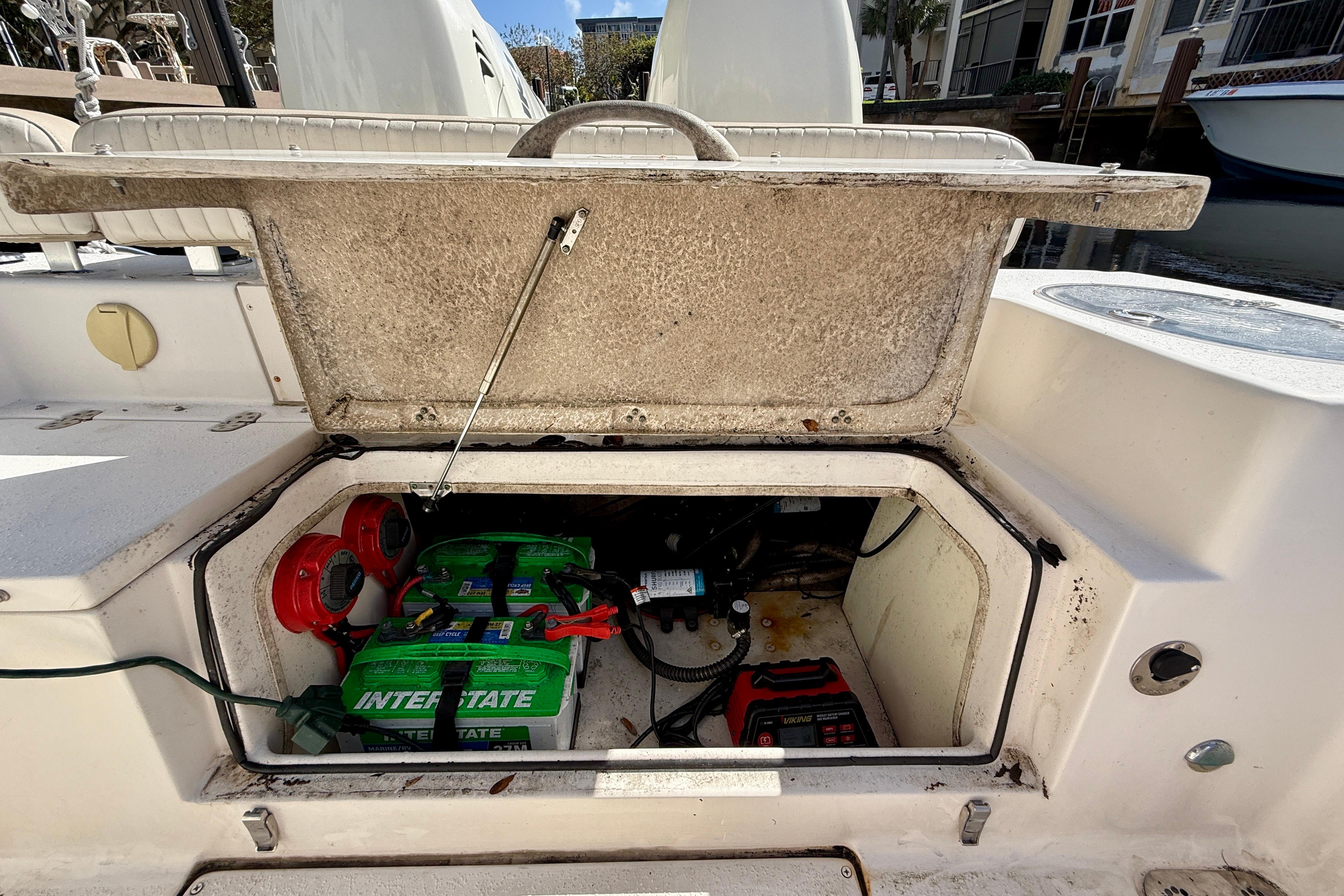 2018 Sea Chaser 24 HFC boat battery compartment with Interstate batteries and wiring.