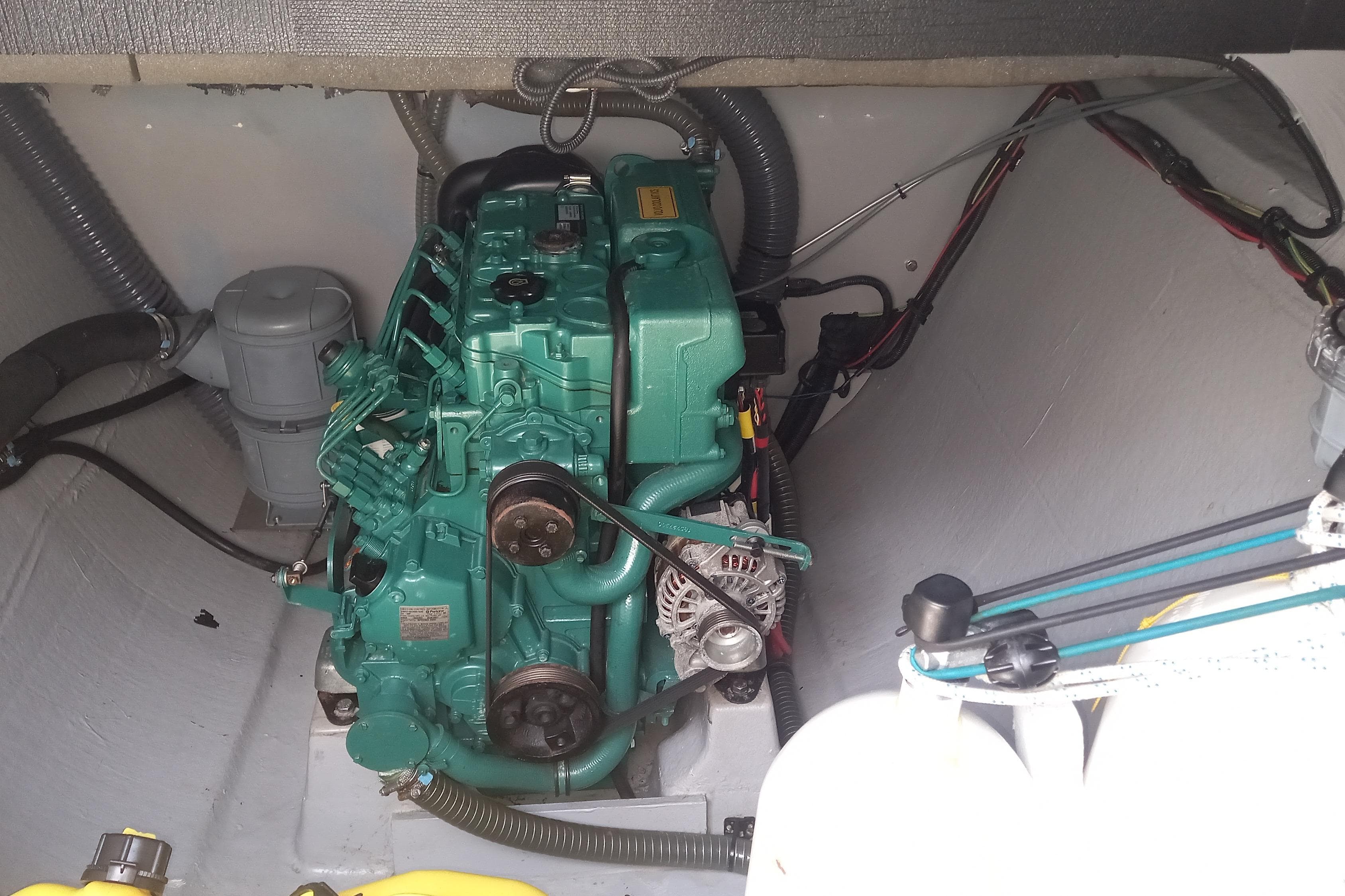 Engine compartment of a 2021 Nautitech 46 Open catamaran, showcasing mechanical components.
