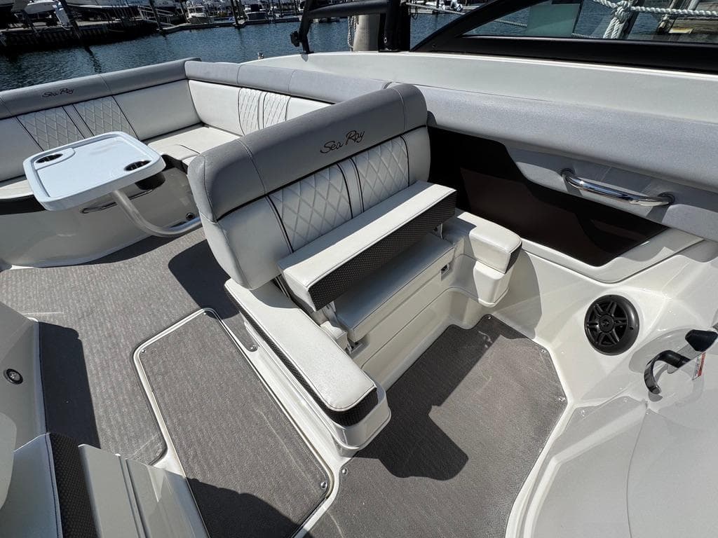 2016 Sea Ray SDX 270 boat interior with plush seating and modern design.