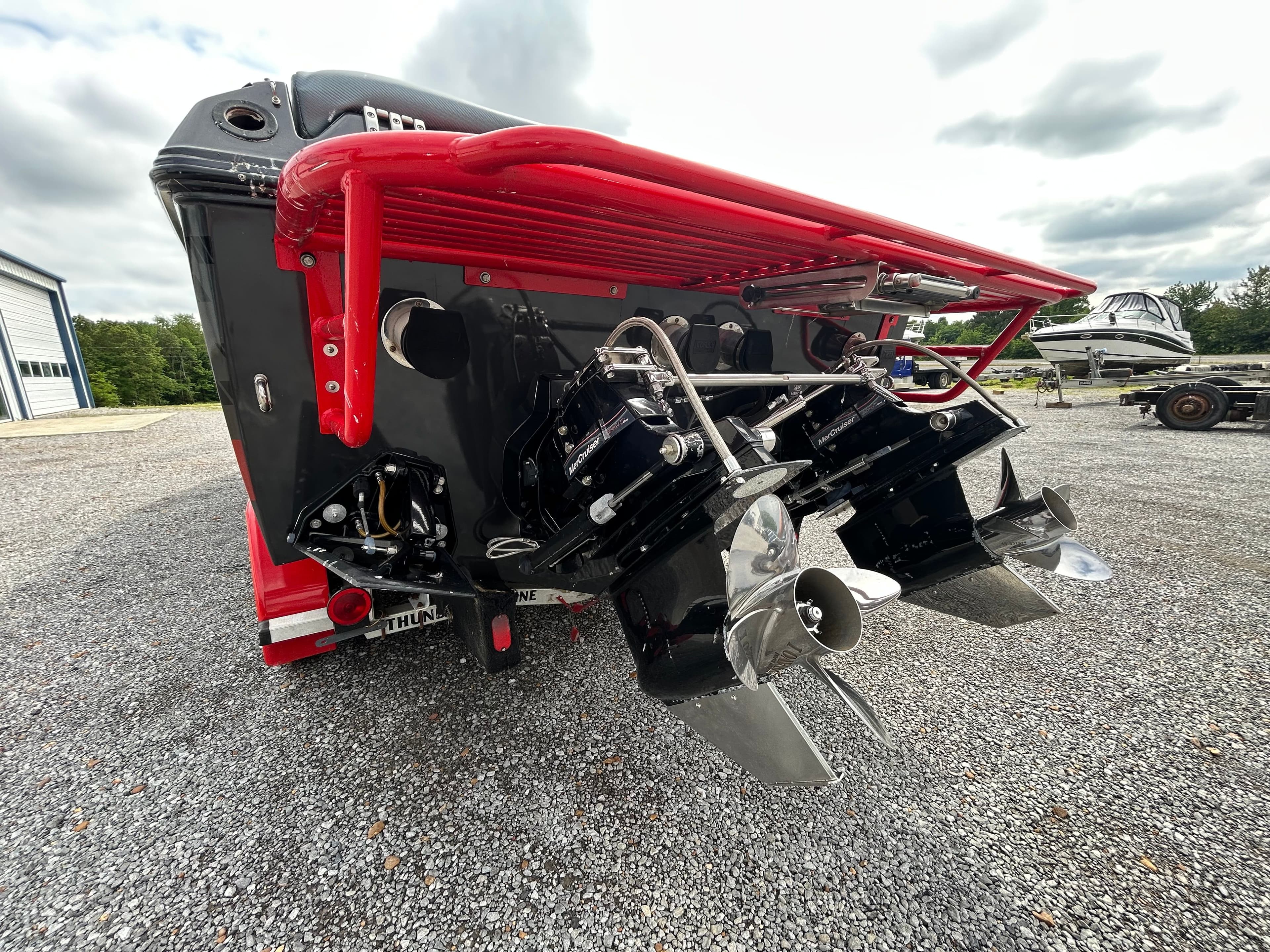 Rear view of a 2006 Baja 30 Outlaw boat with dual engines.