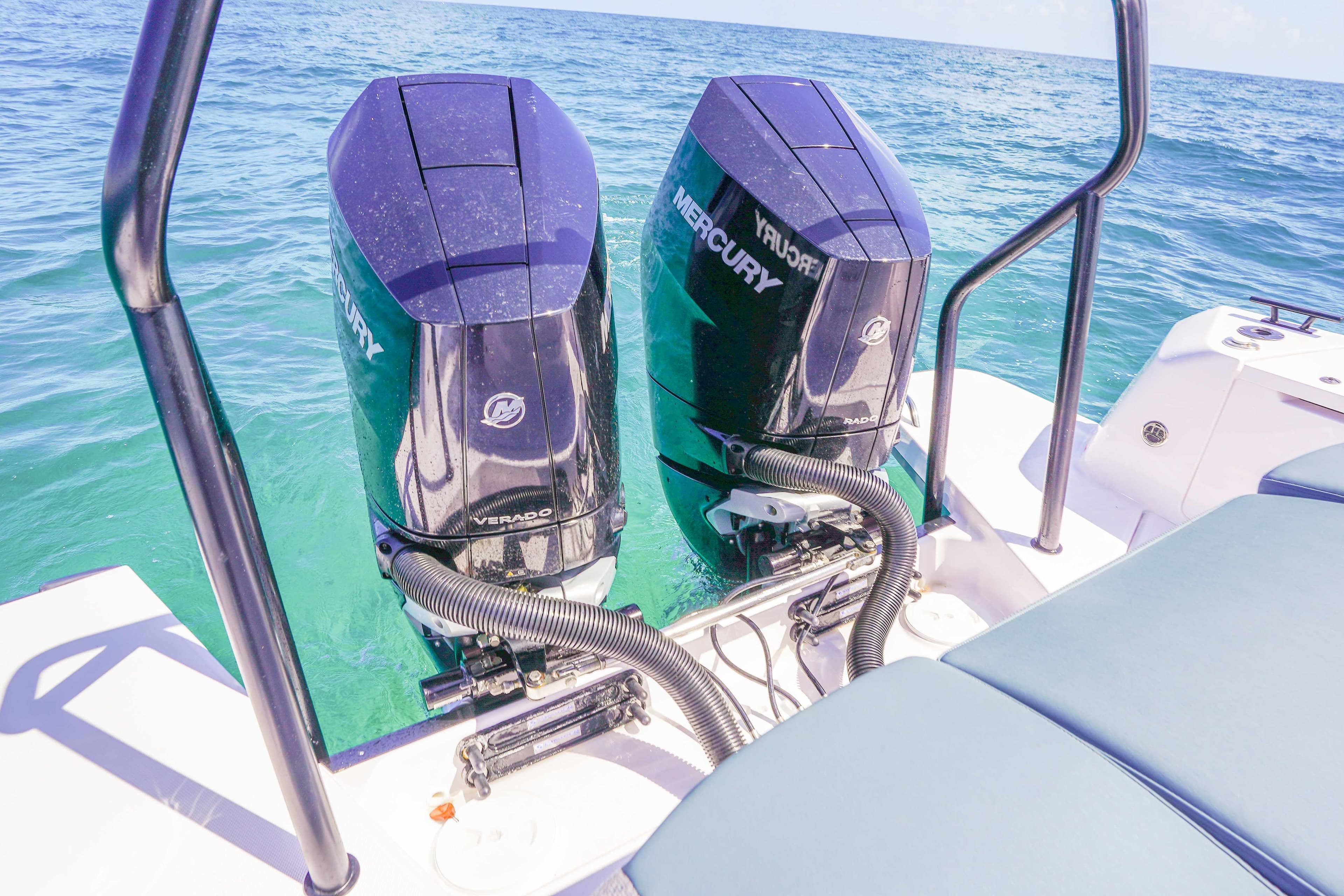 2024 Axopar 37 XC Cross Cabin with twin Mercury outboard engines on open water.