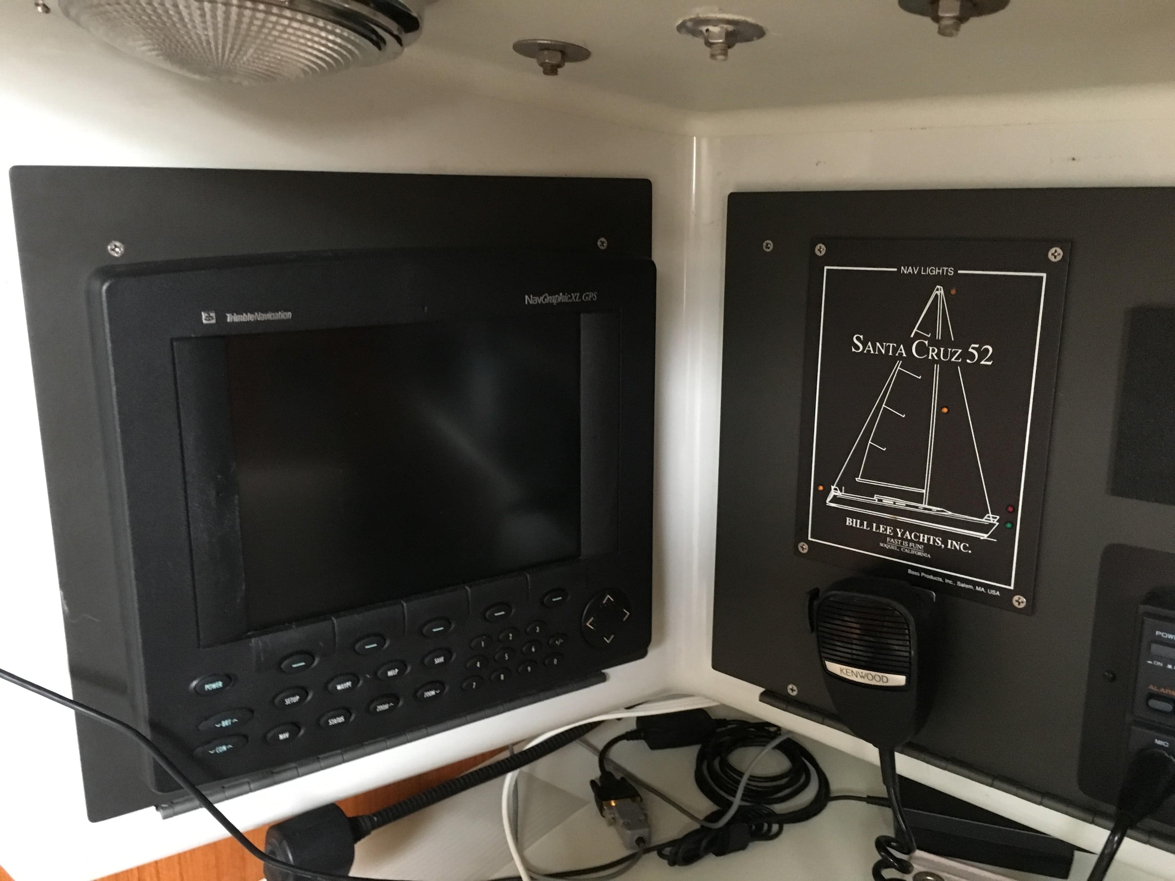 Control panel of a 1993 Santa Cruz 52 yacht with navigation equipment.