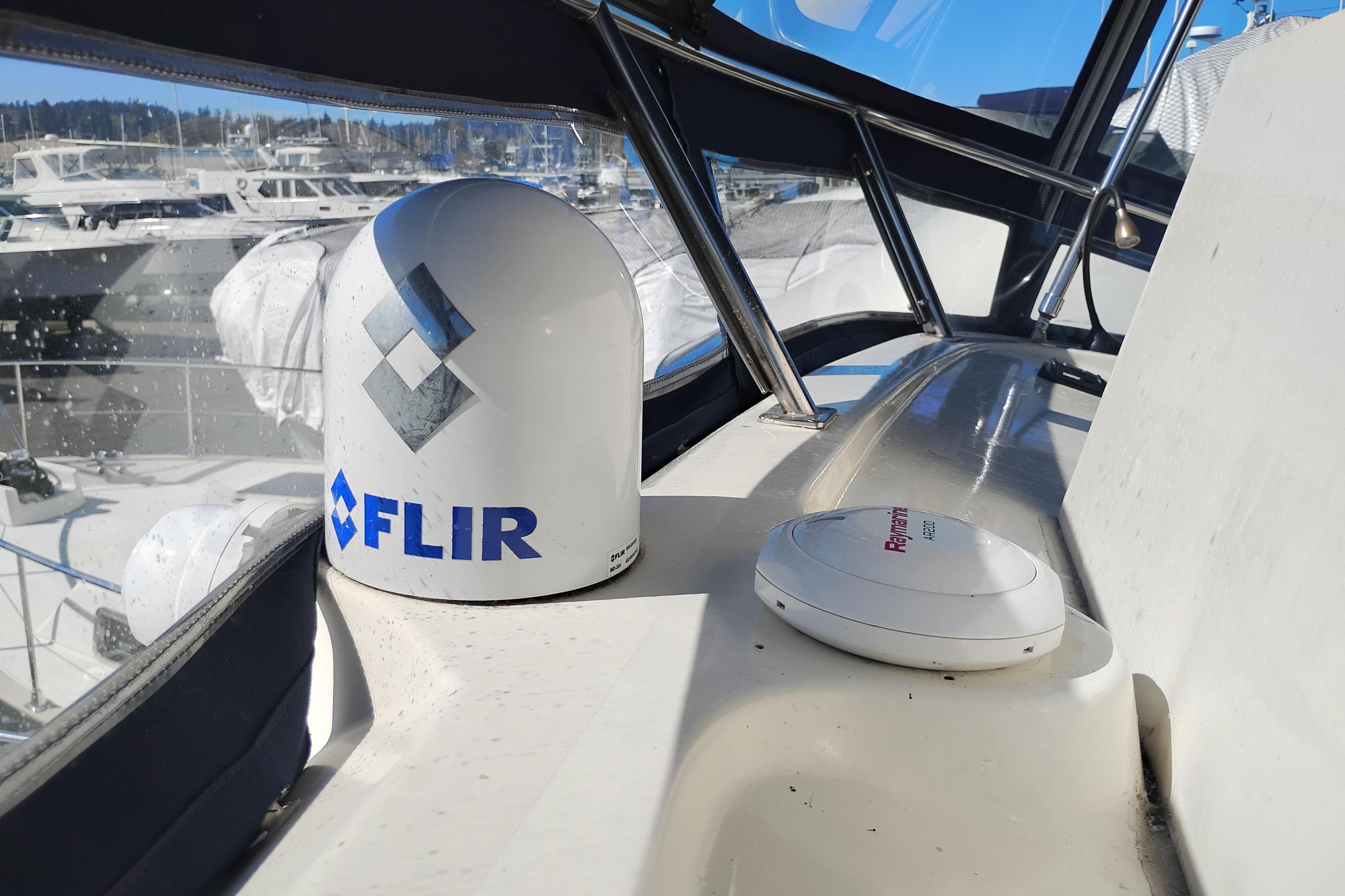 1988 PT 52 AFT Cabin Motor Yacht with FLIR and Raymarine equipment on deck.