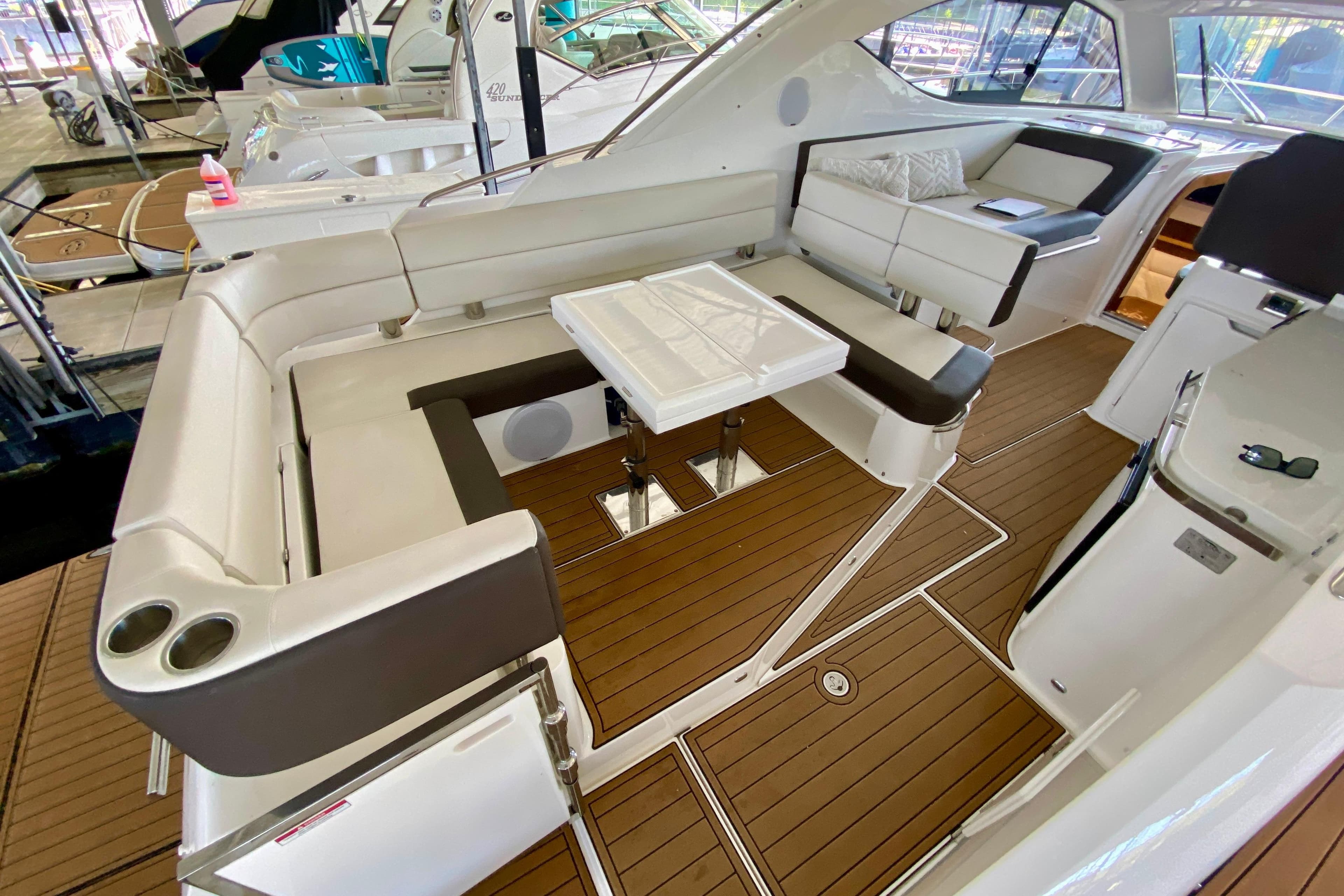 2018 Galeon 385 HTS yacht interior with elegant seating and wooden flooring.