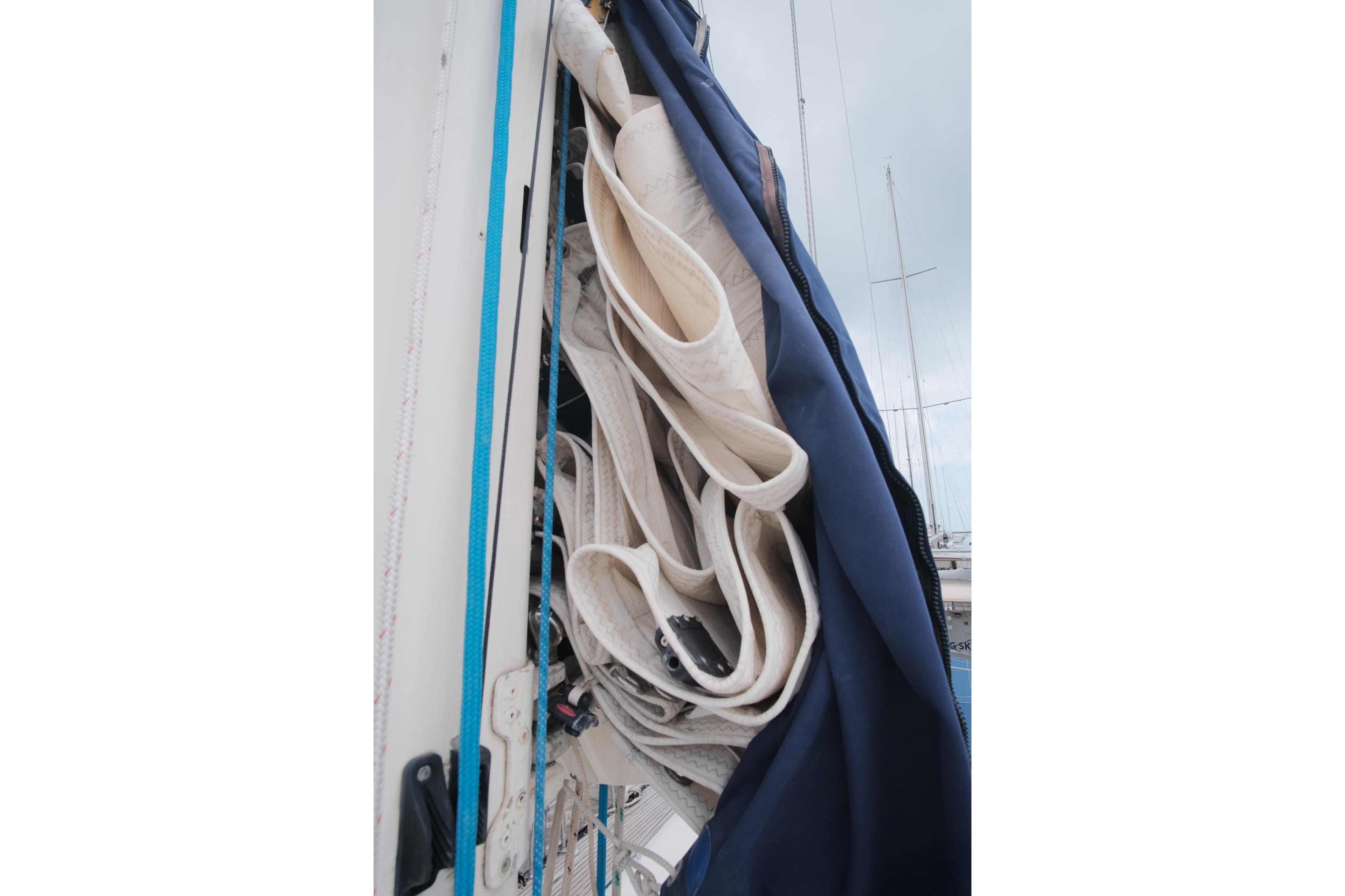 Sail storage on a 2000 X-Yachts 442 MK II, featuring neatly folded sails.
