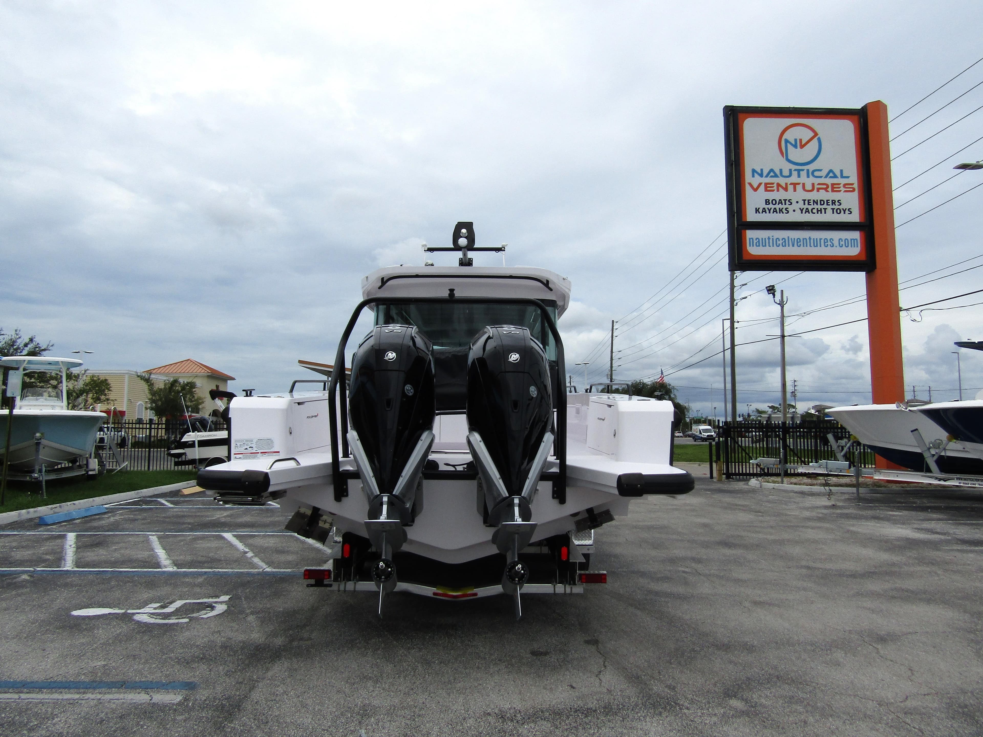 2024 Axopar 37XC CROSS CABIN with dual engines at Nautical Ventures dealership.